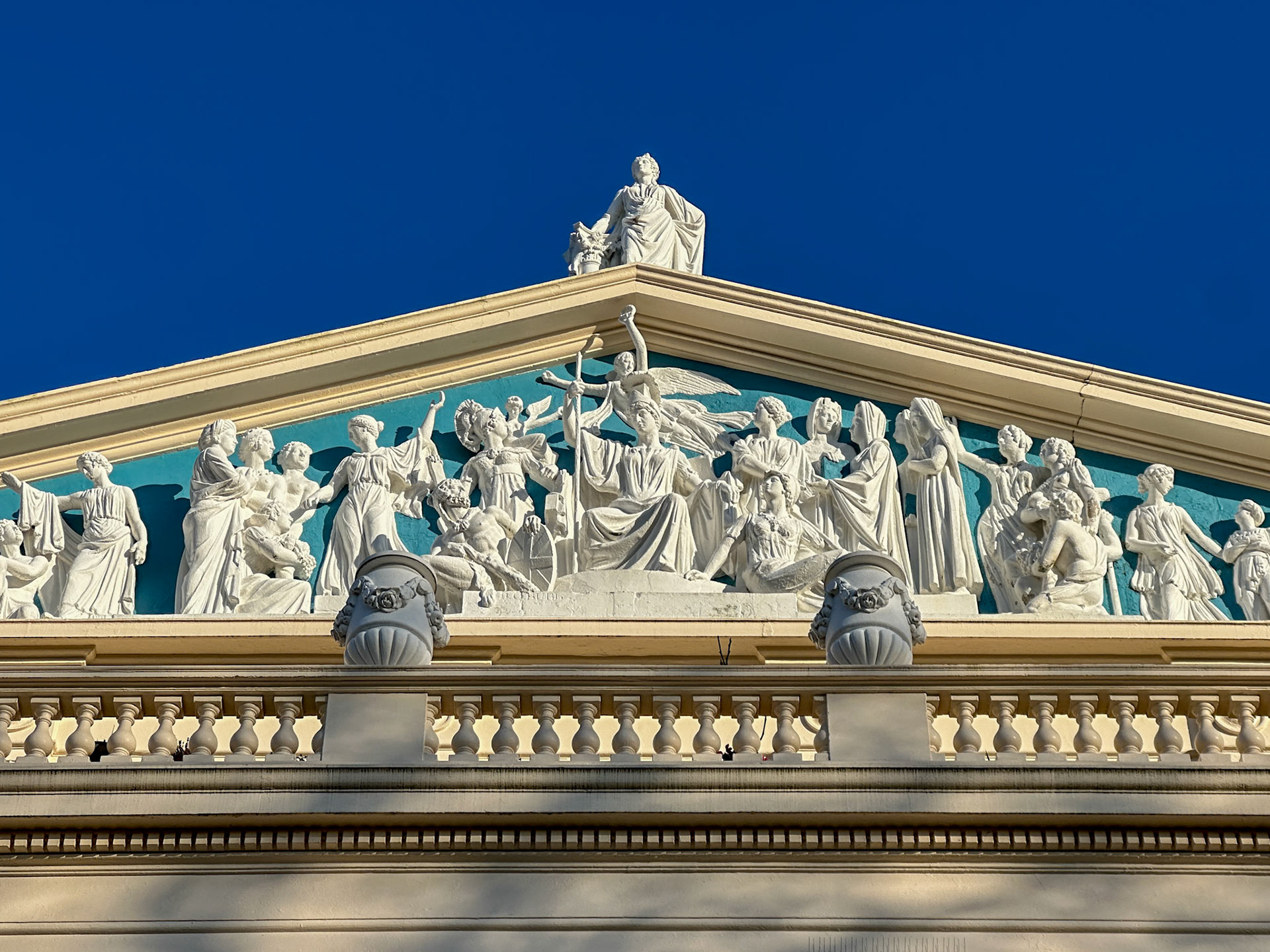 Looking up at a decorated pediment on Cumberland Terrace, Regent's Park, London