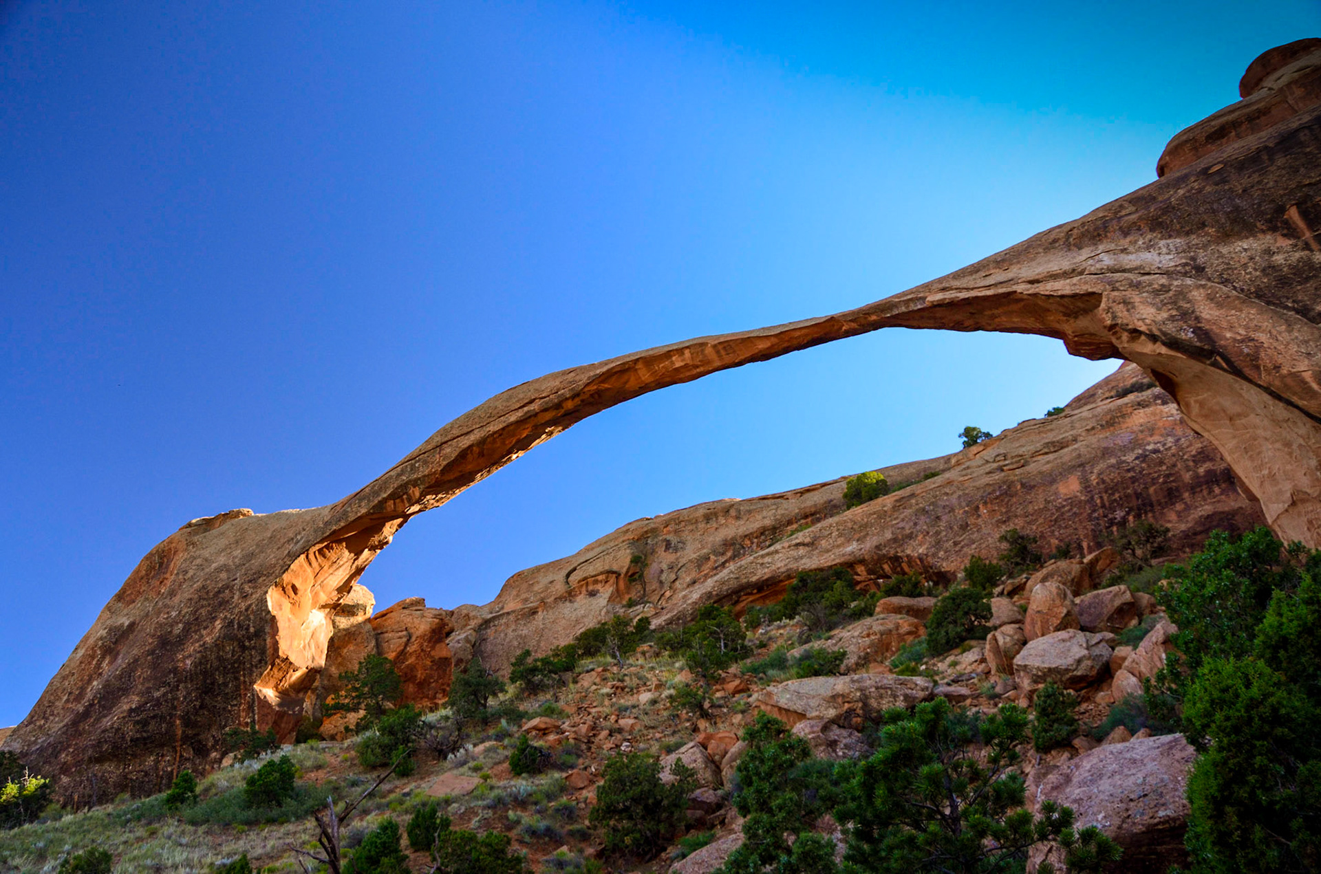 Landscape Arch in evening light against the blue sky