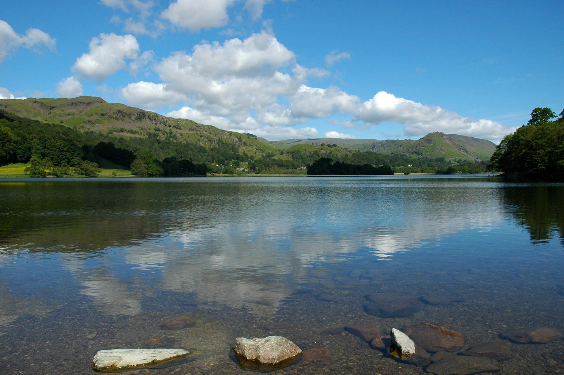 Clouds and mountains reflected in Grasmere in the English Lake District
