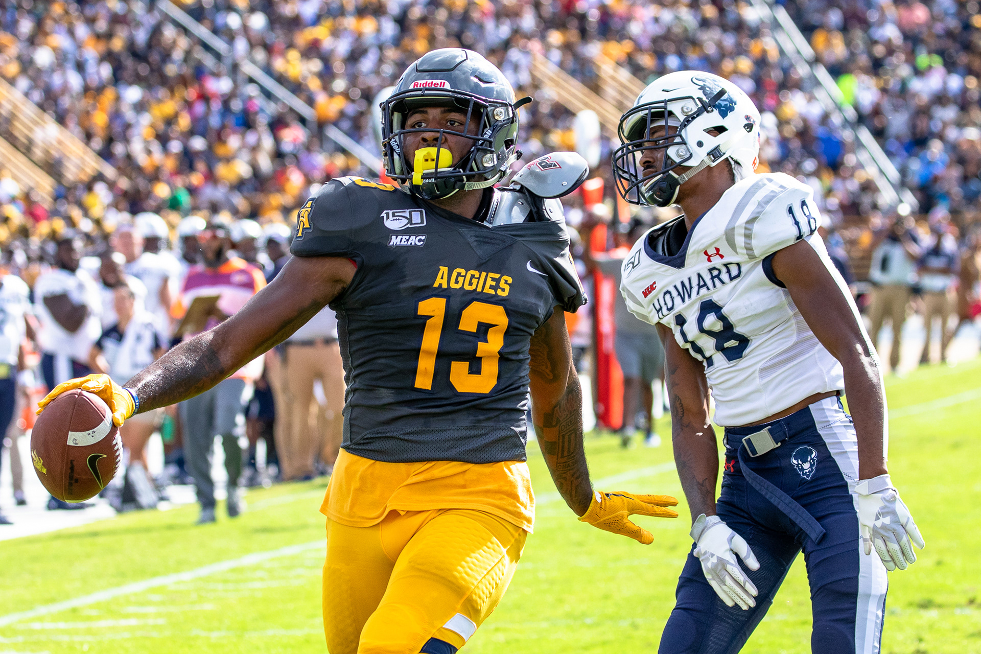 First Place in Sports Reaction Category | NC A&T senior wide receiver Elijah Bell (13) celebrates a touchdown after making a catch over Howard sophomore defensive back Jalen Smith (18) in BB&T Stadium in Greensboro, N.C., Saturday, Oct. 26, 2019. The Bulldogs beat the Bison 64-6 in their homecoming game.