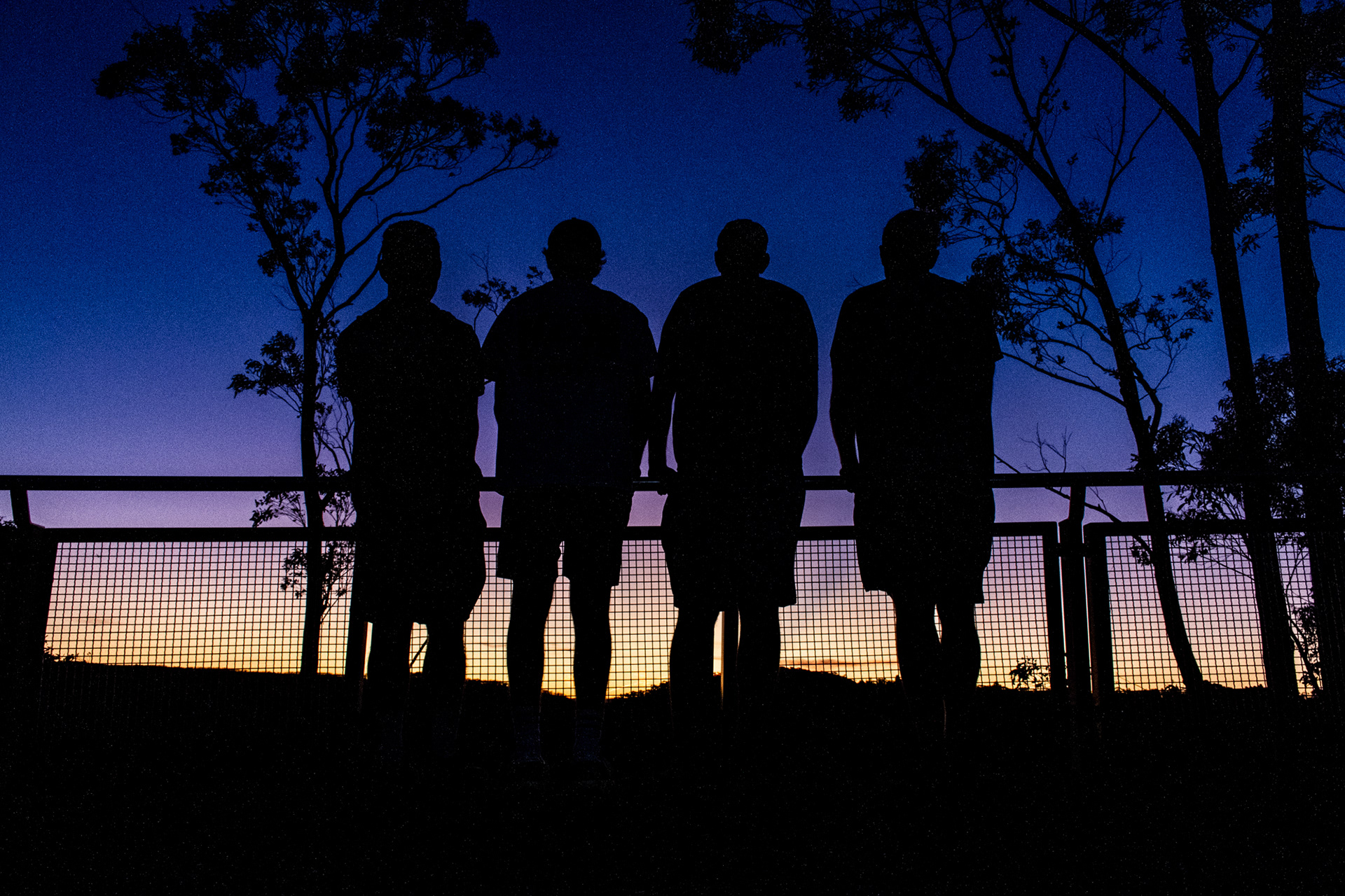 Visitors watch the sunset at the Blue Mountains National Park near Sydney, March 18, 2020.