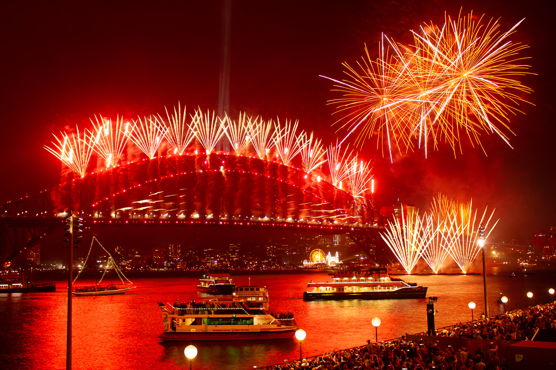Thousands of visitors watch the New Year's Eve fireworks over the Sydney Harbour from the base of the Sydney Opera House in Sydney, Jan. 1, 2020. While large parts of Australia burned during the nation's most catastrophic bushfire season in history, Sydney's world-famous fireworks display was one of the only shows to still go on in the country.