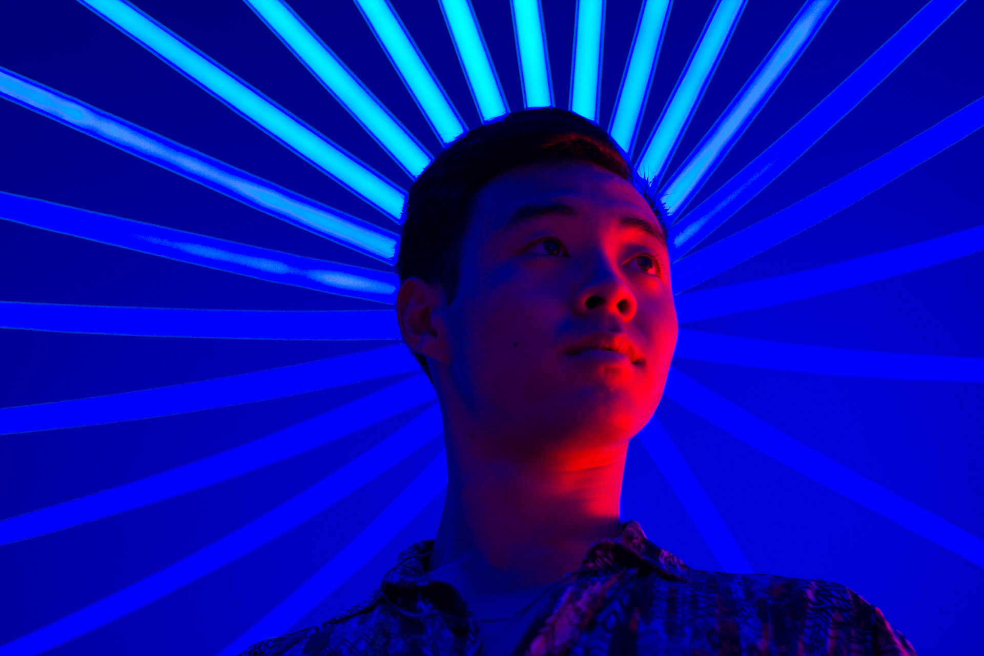 Derek Ji poses for a portrait in the Dodecalis Luminarium in Sydney, Jan. 26, 2020. The inflatable art exhibit, which uses natural light to create a colorful maze of rooms, was on display for 19 days as part of the Sydney Festival 2020.