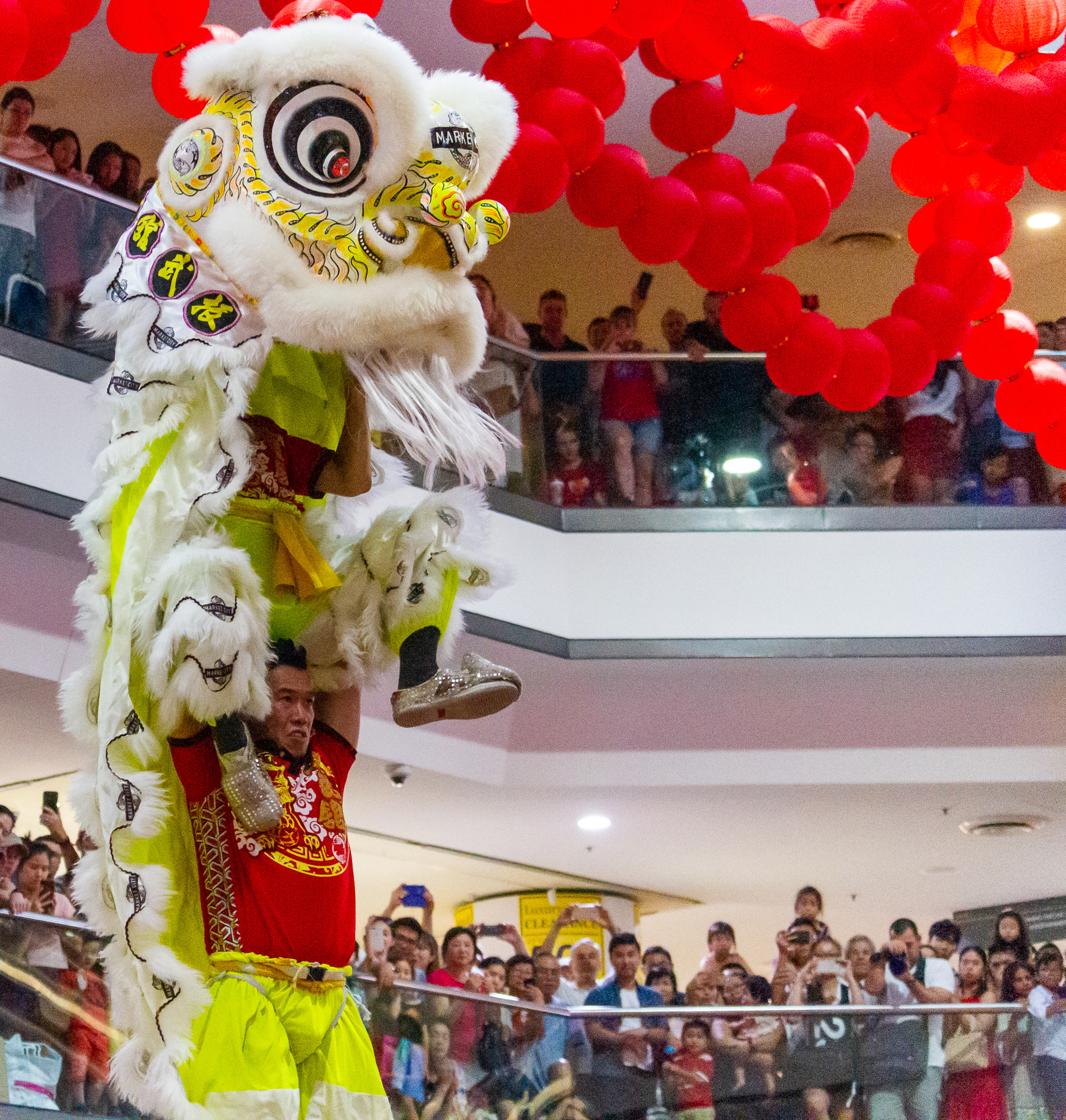 Two lion dancers perform in the Market City mall in Chinatown in Sydney, Jan. 25, 2020. The highly coordinated dance performed atop narrow pedestals kicks off 16 days of festivities celebrating the Lunar New Year.