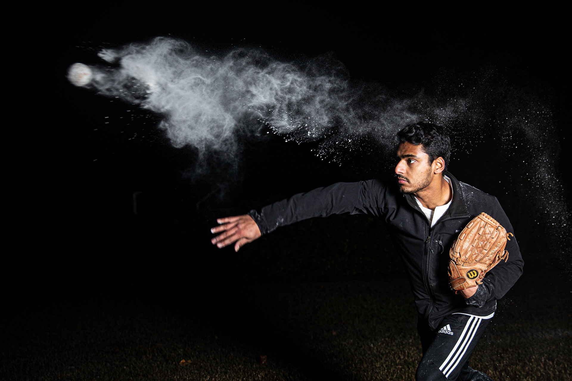 Neeral Patel makes a throw in Chapel Hill, N.C., Nov. 17, 2020. He played baseball in little league from elementary school through middle school. “I enjoyed playing baseball because it was very similar to me playing cricket when I was growing up,” he said.