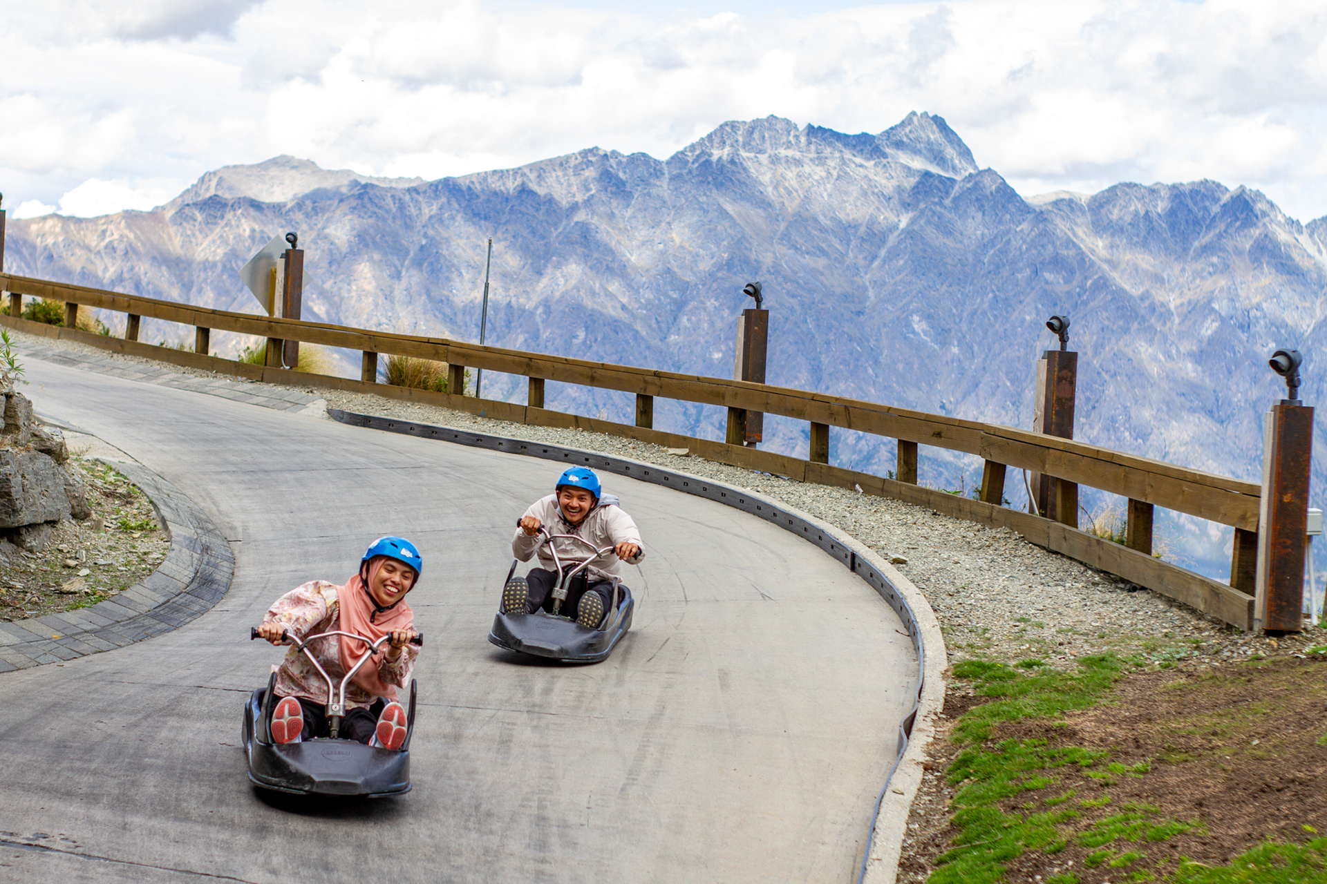 Two people race down the Queenstown Luge in Queenstown, New Zealand, Feb. 17, 2020.