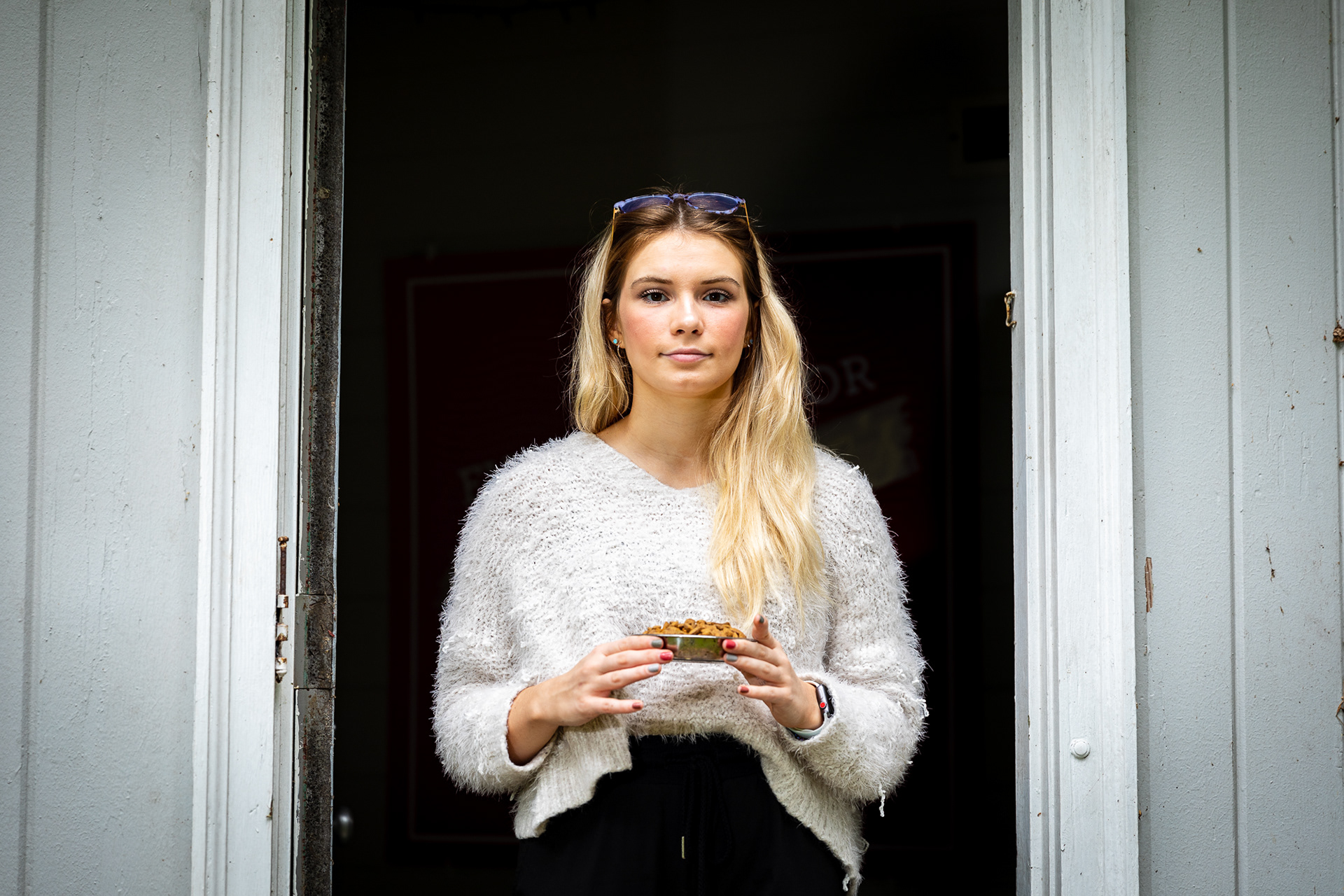 UNC student Claire Heffner poses for a portrait in Chapel Hill, N.C., Oct. 16, 2020. Last year she founded Feral2Sterile, a club whose goal is to help feed and sterilize feral cats in the area. “It’s hard to see so many hungry animals around campus,” she said.