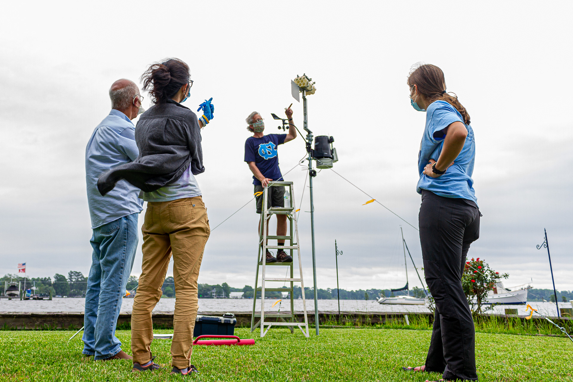 Honorable Mention in General News Category | Researchers from the UNC Institute of Marine Science set up an aerosol collection unit to measure toxins produced by cyanobacterial blooms in Edenton, N.C. on June 11, 2020. Toxic cyanobacteria has been an increasingly pressing problem over the last five years as massive blooms overwhelm local estuarian ecosystems.