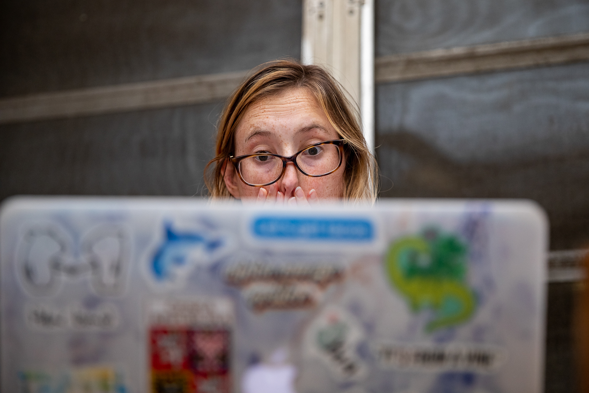Kyle McClintock reacts to an announcement on a Zoom call for her sorority in Chapel Hill, N.C., Aug. 27, 2020. Her sorority at NC State, Alpha Omega Epsilon, has no in-person events due to the coronavirus pandemic.