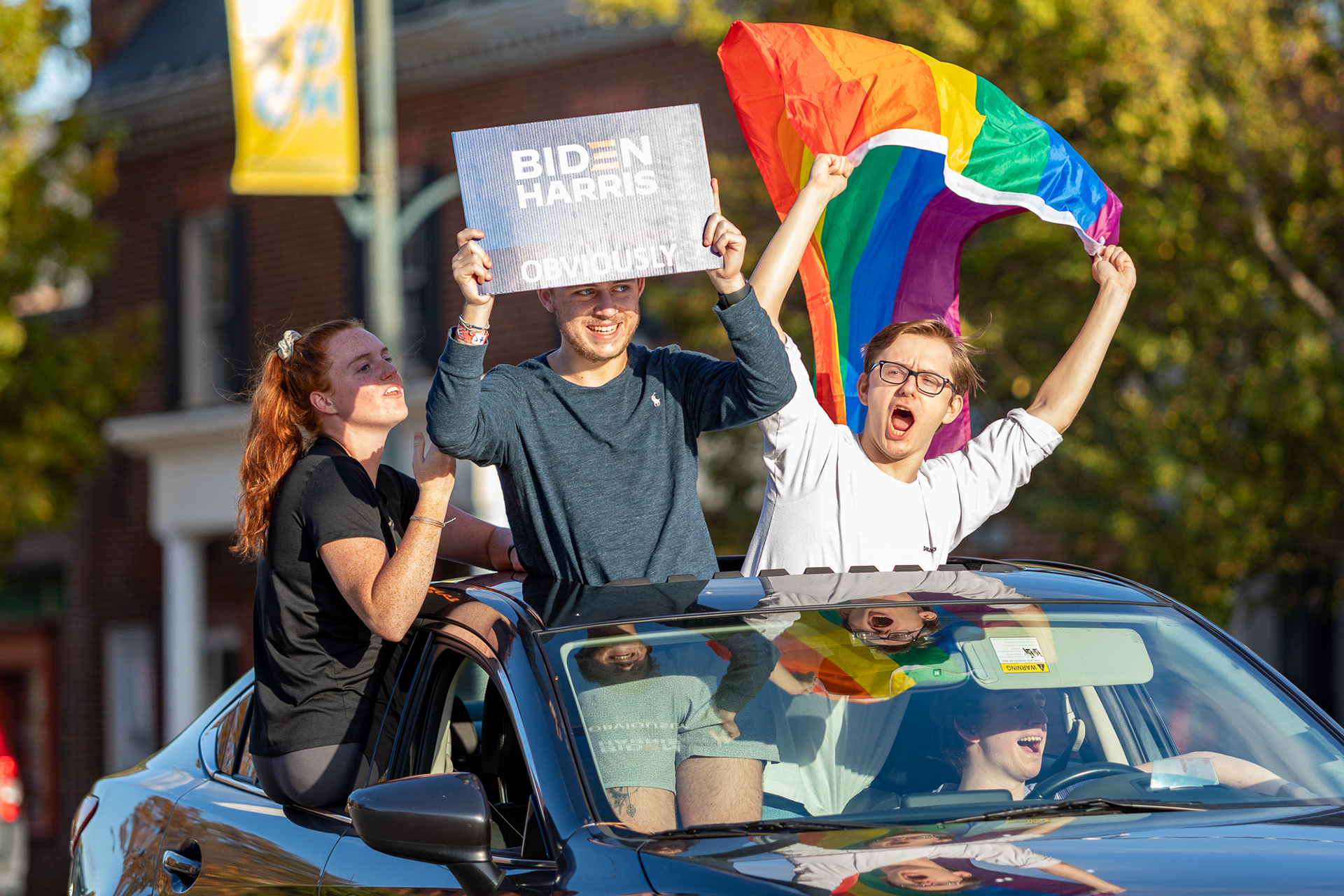 Students celebrate on Franklin Street in Chapel Hill, N.C., Nov. 11, 2020 after Joe Biden beat President Donald Trump to become the next president of the United States.