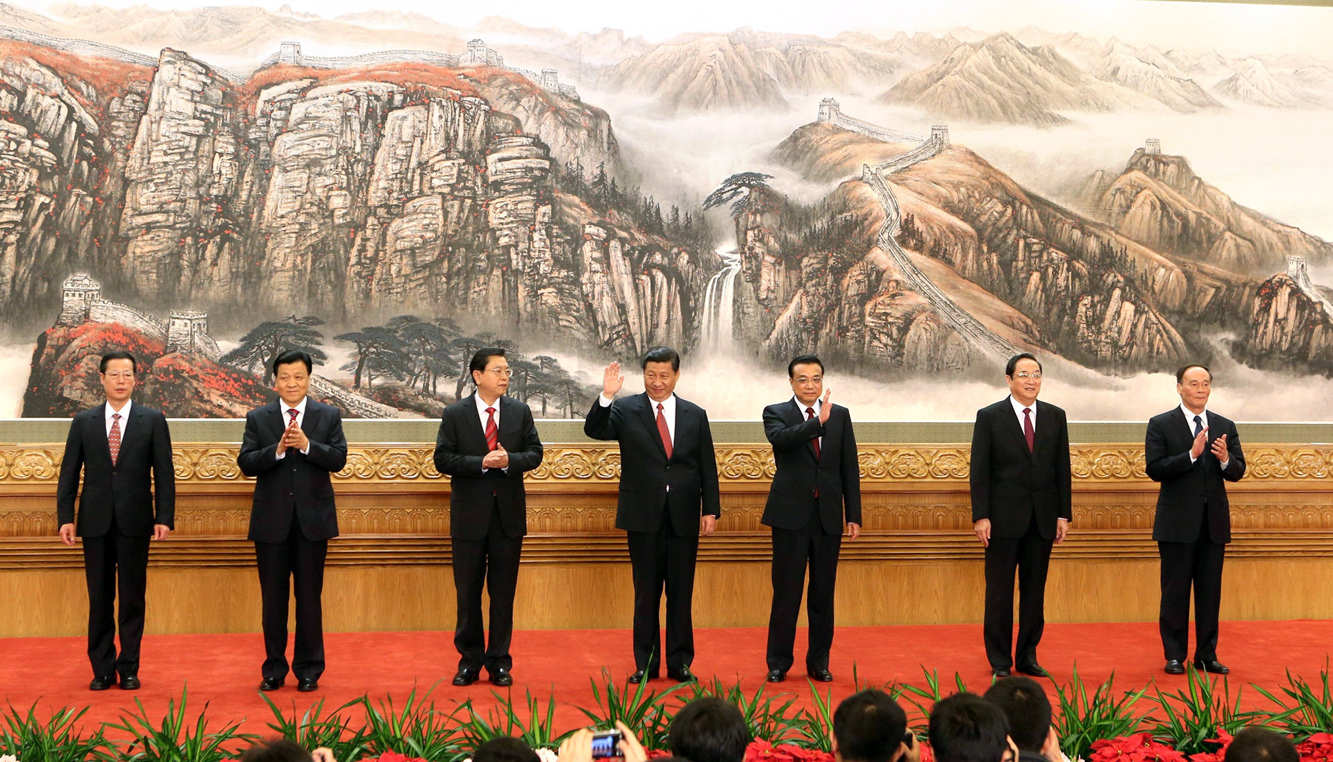 On October 23, 2022, Xi Jinping was officially introduced as China's top leader at the Communist Party Congress, securing his third term as General Secretary. In this historic moment, he stepped forward with the newly selected Politburo Standing Committee, signaling the consolidation of his leadership and the beginning of a new era in Chinese politics.