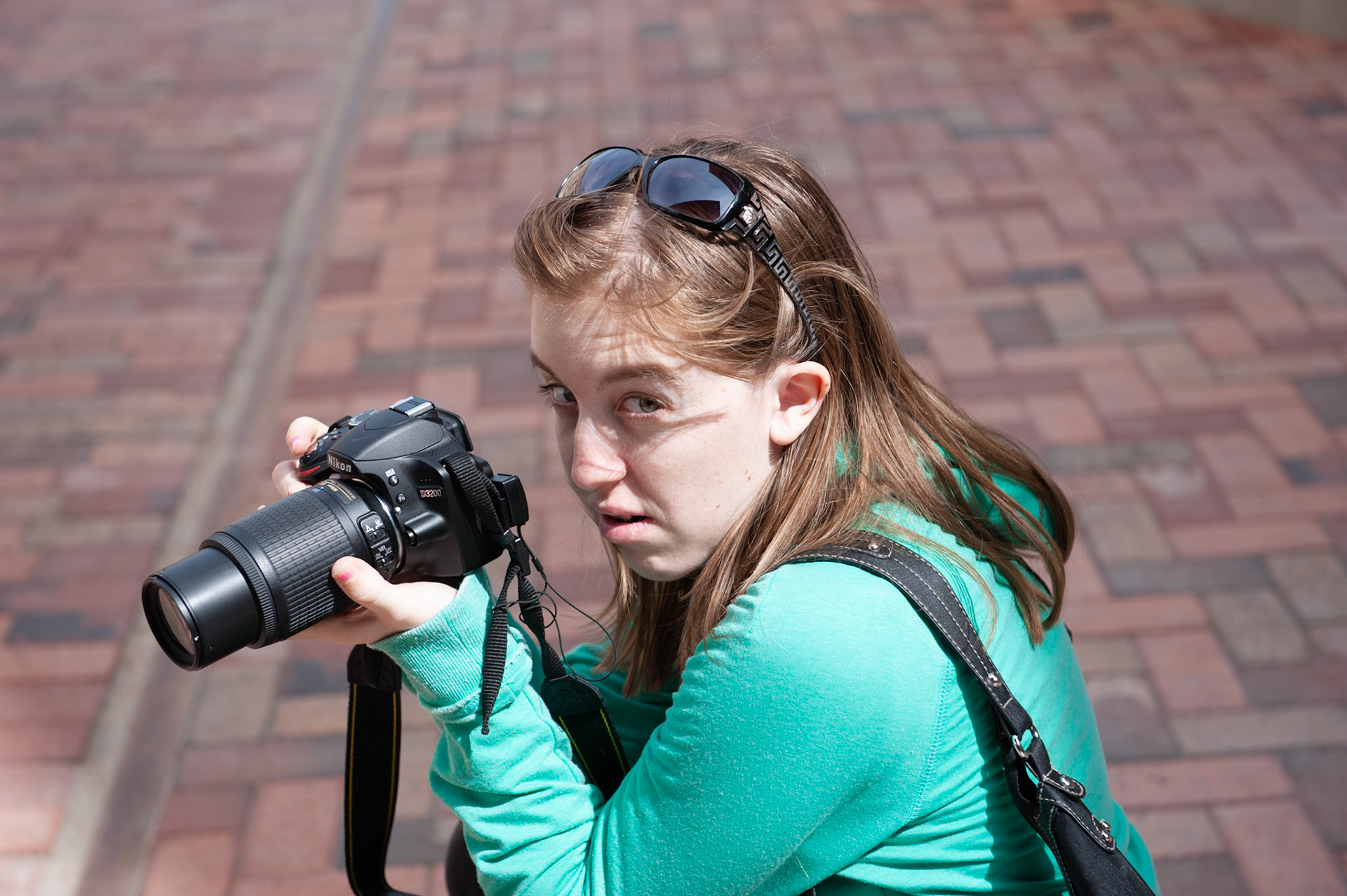 Rebecca, shooting Denver Broncos Stadium