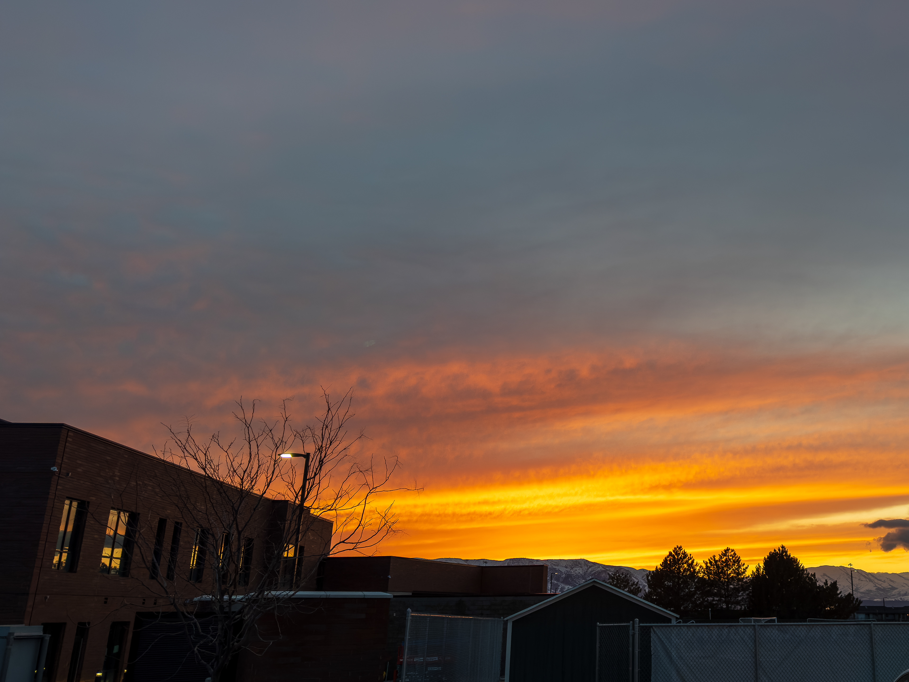 Golden Glow: Sunset by the UVU Alumni Building