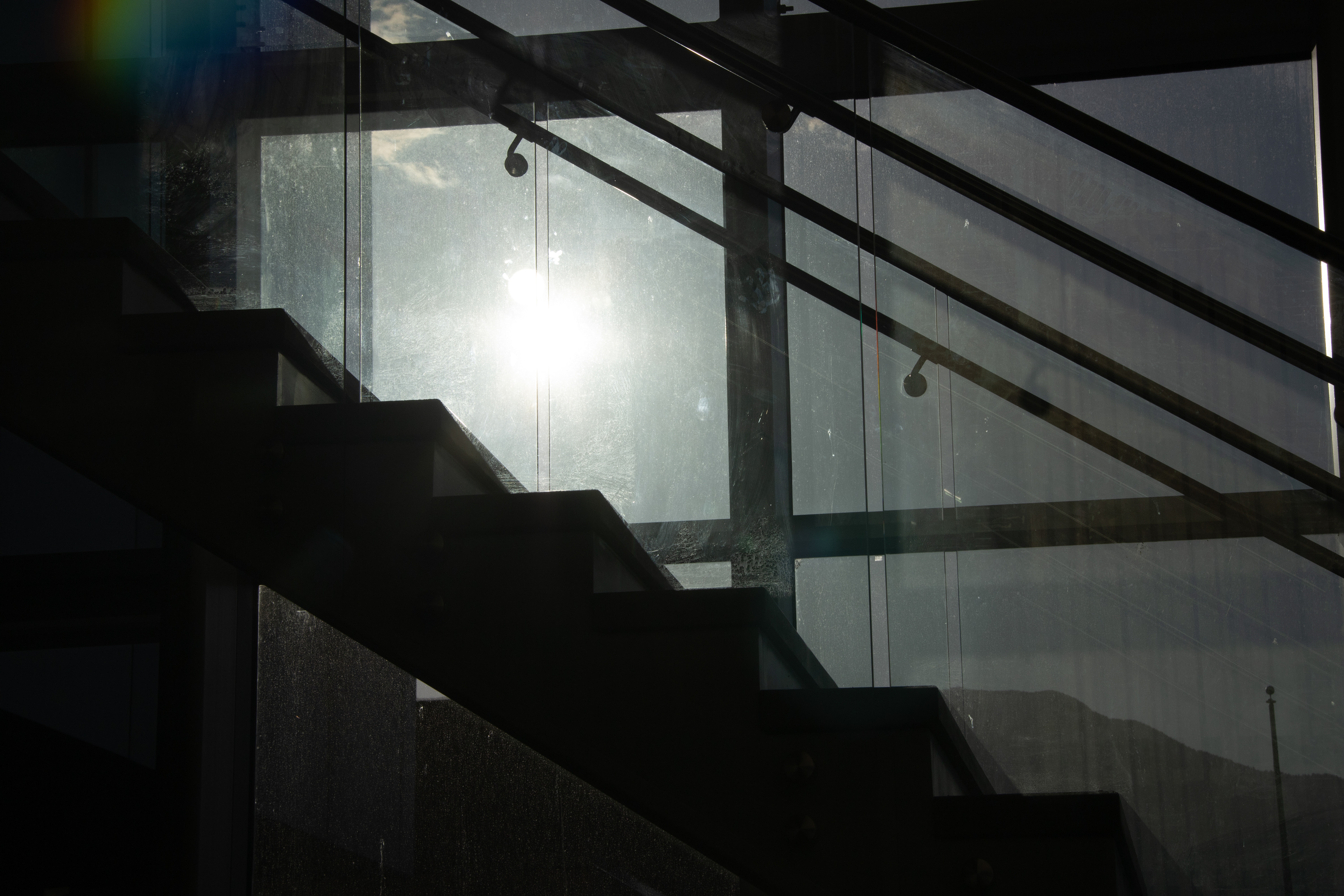 Symphony of Lines and Light: Staircase and Windows in Architectural Harmony