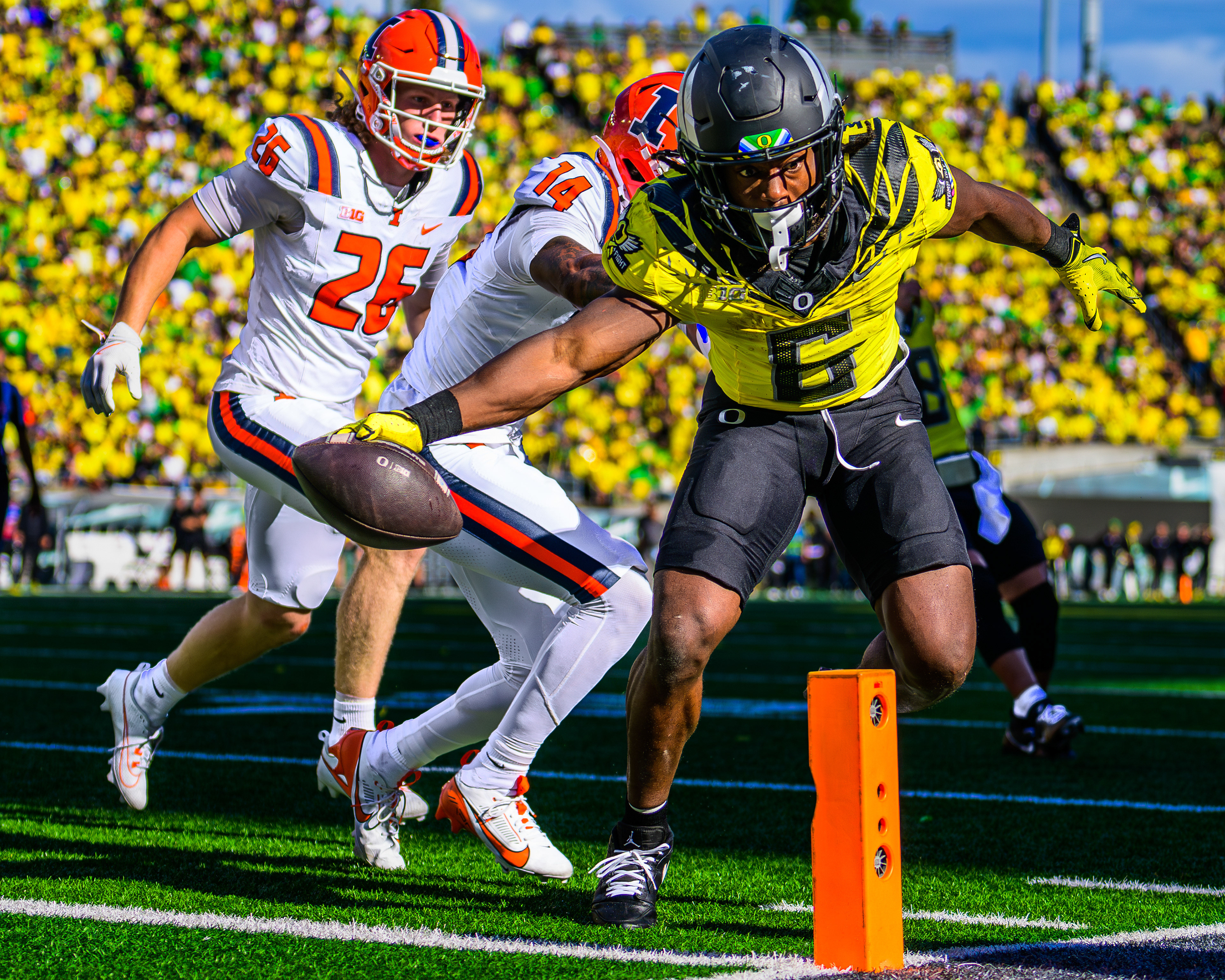Oregon Ducks running back Noah Whittington, #6, reaches for the endzone during a game against the University of Illinois Fighting Illini at Autzen Stadium in Eugene, Ore., on Oct. 26, 2024. Led by offensive coordinator Will Stein, the Ducks are averaging over 35 points per game scored in the 2024 season. 