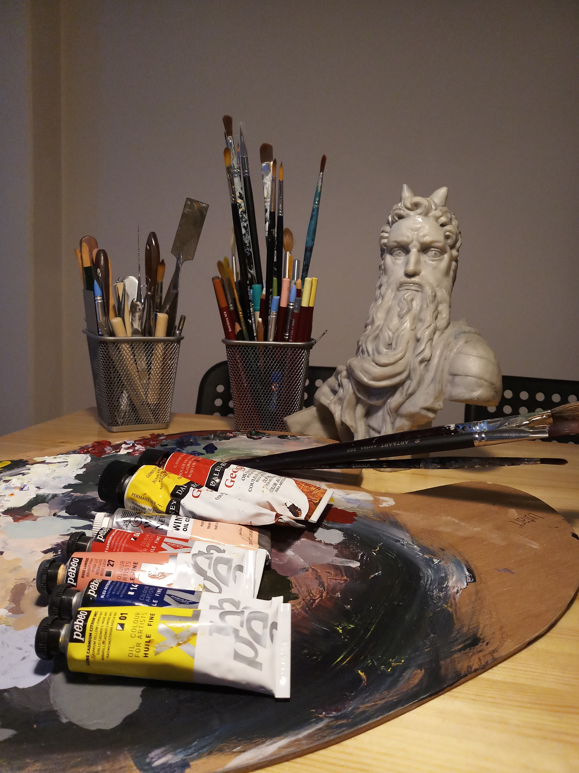 Painting and Moses Sculpture
