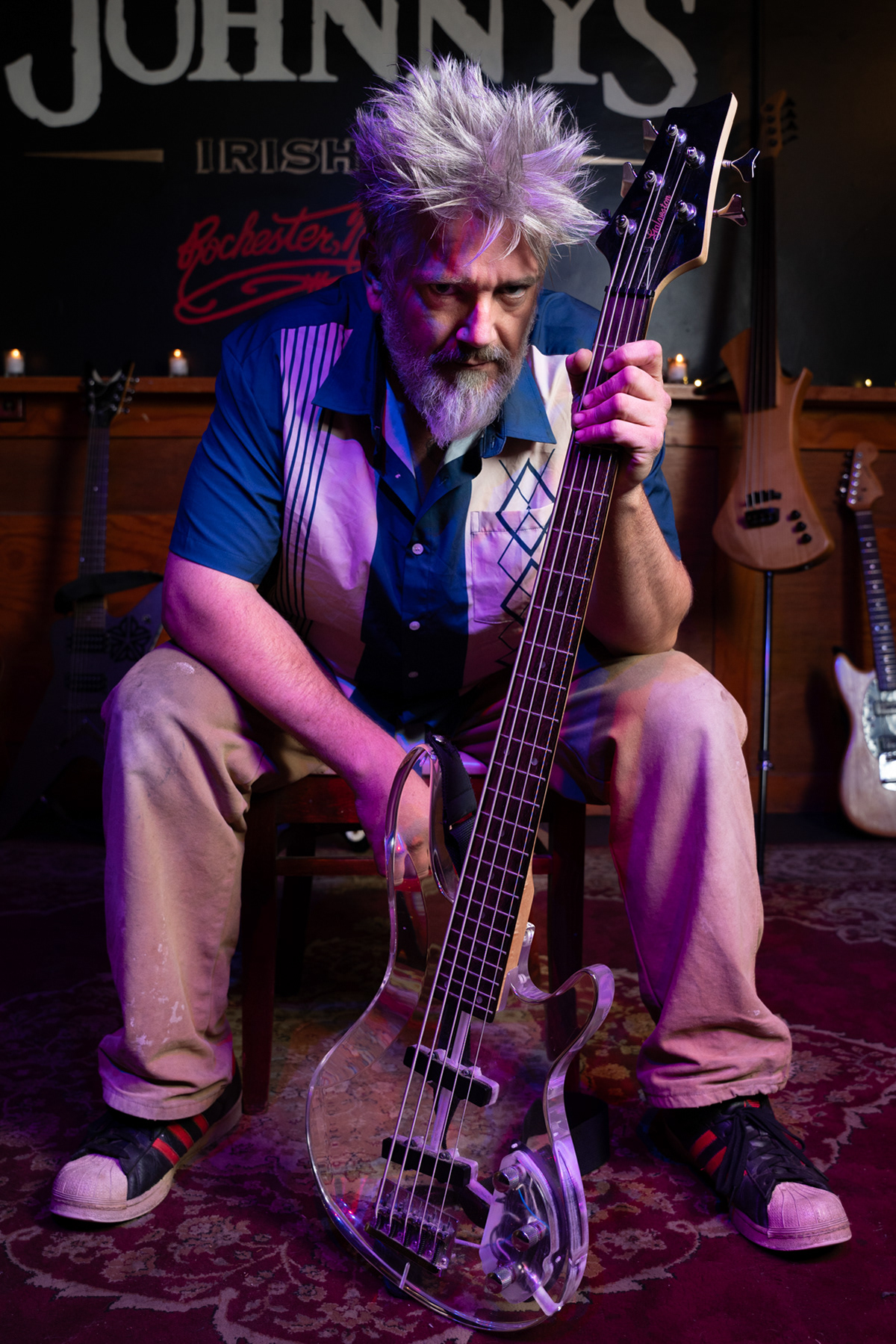 Pyntch Roberts in Johnny’s Irish Pub in Rochester, NY on Sept. 28, 2023.   “Pyntch” has been gigging in Rochester for almost four decades.  He plays a variety of instruments and bands, currently playing in Godslove, Gavin Barry, Rebel Banjo Circus, and Grand Jester.  His musical interests span from “Psychedelic Math Metal” to traditional Irish folk music.