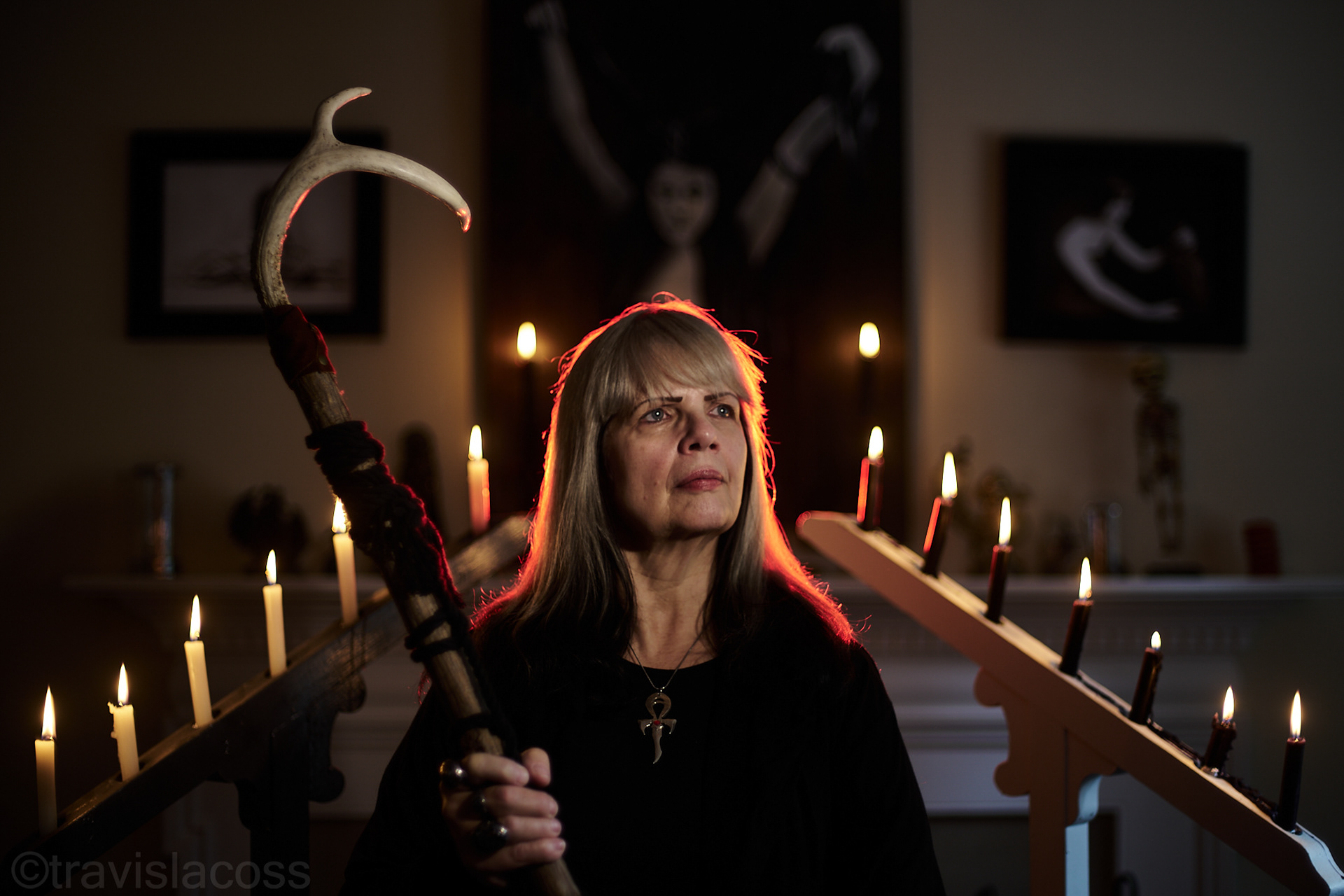 Rauncie Reynolds poses in her home for a portrait on Sunday, Nov. 17, 2024, in Rochester, N.Y.   Rauncie Reynolds also is a pagan minister, in Rochester. She practices by being a minister at a local university and volunteering at local hospitals.  