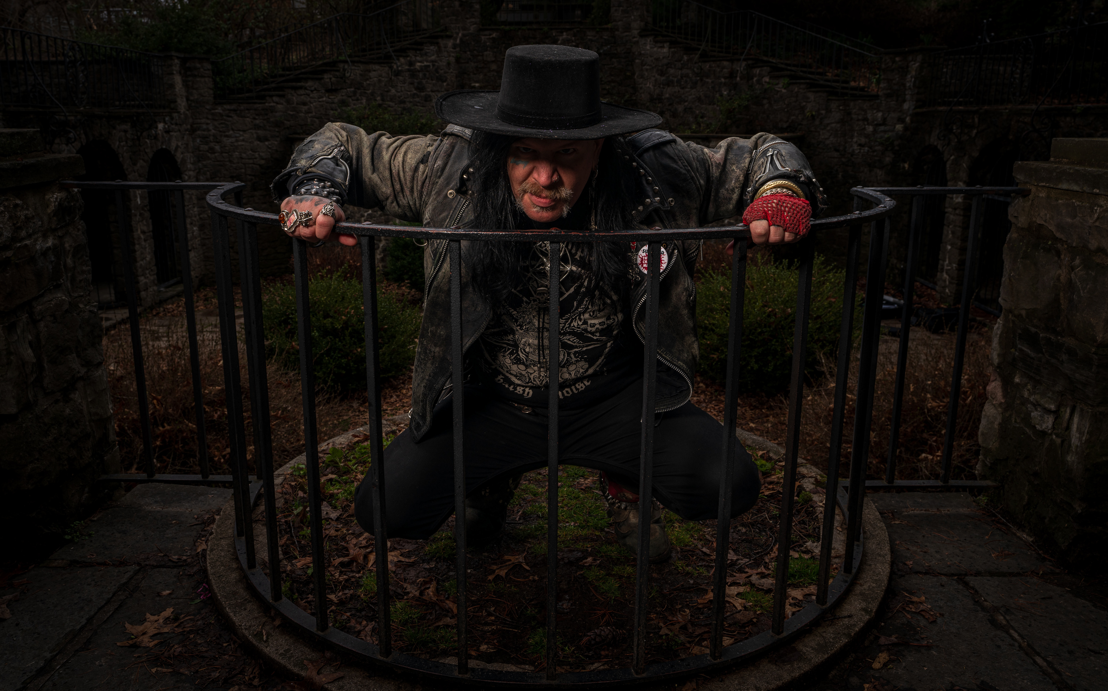 James Von Sinn a Pagan Satanist and frontman for a punk band Rotten, talks about the upcoming solar eclipse in the sunken garden of Warner Castle in Rochester, N.Y. on April 6, 2024. 
