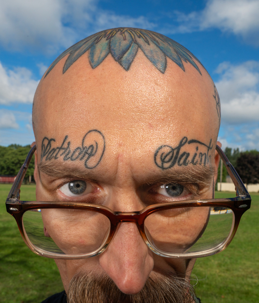 “Its my rise from scum to saint, that’s truly what I believe.”  When reflecting on his past he stated “ I was not born scum, I was a good kid, but I lost my way, but here I am again.” says Wollschleger.  He now focuses on creating positive energy by making heavy metal music, as the frontman for a band Godslove. Andrew Wollschleger stares deeply at me as he would if he were removing bad energy, at a park near his home in Greece, NY on Sept. 14, 2023.  