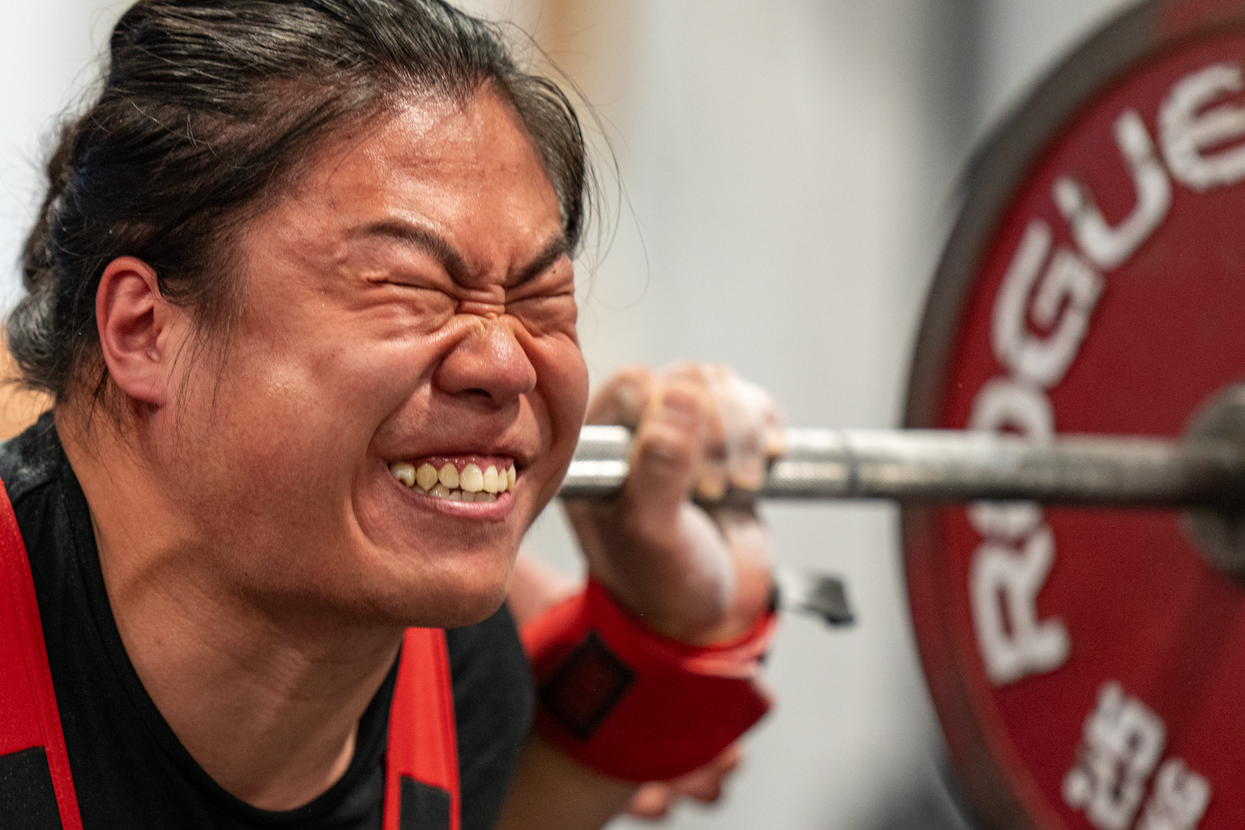 Xiangyu Yan during performing one of three attempts of the squat during the USA Powerlifting Rochester Rumble V  in Henrietta , NY on Sept. 9, 2023. 