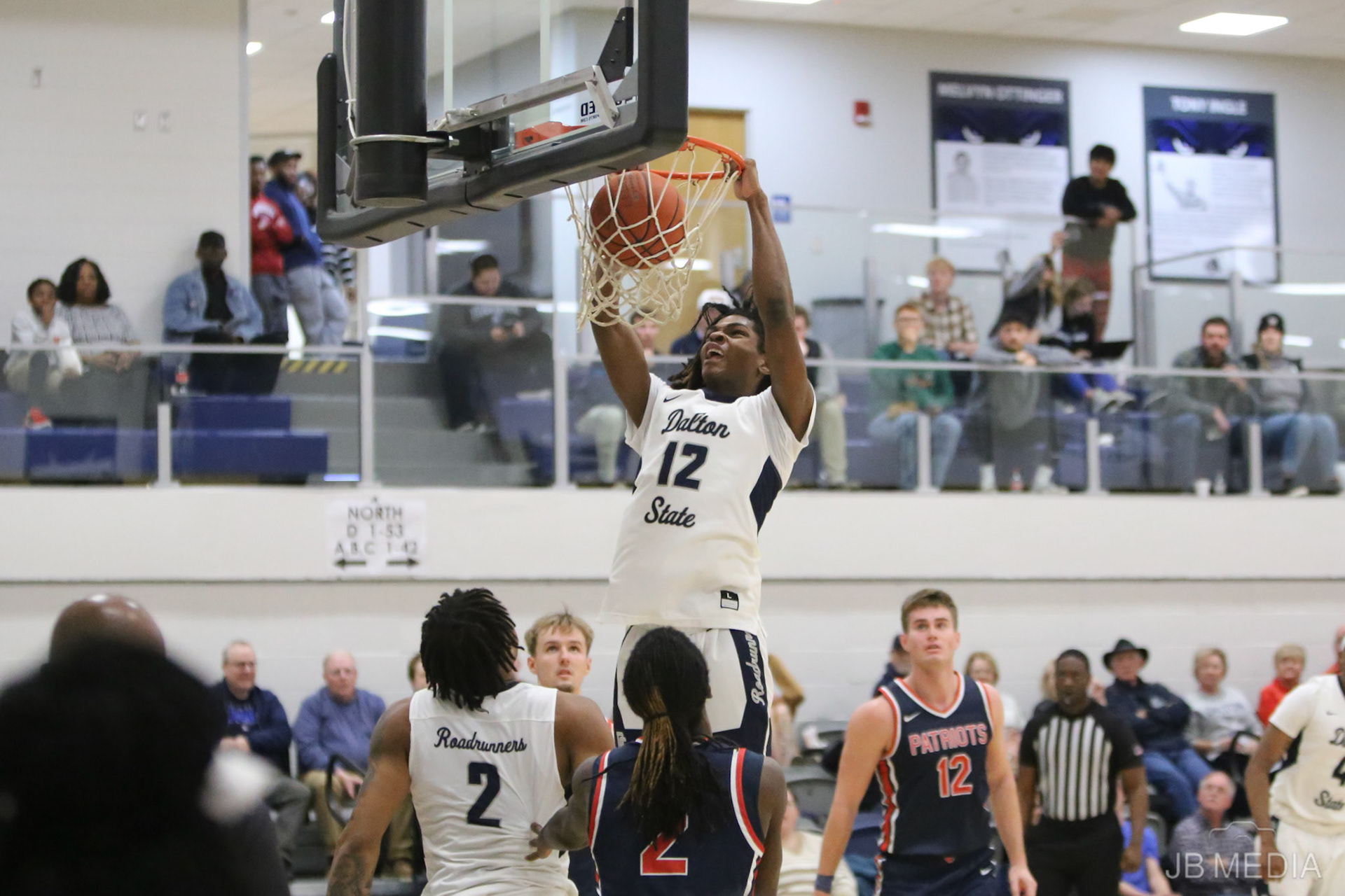 DALTON, GA - Dec 2: Matt Compas #12 of the Dalton State Roadrunners scores a dunk against University of the Cumberlands Patriots at Bandy Gymnasium in Dalton, GA. The Roadrunners defeated the #9 Patriots 88-80. (Photo by Jeremy Barfield/JBfotomedia.com)