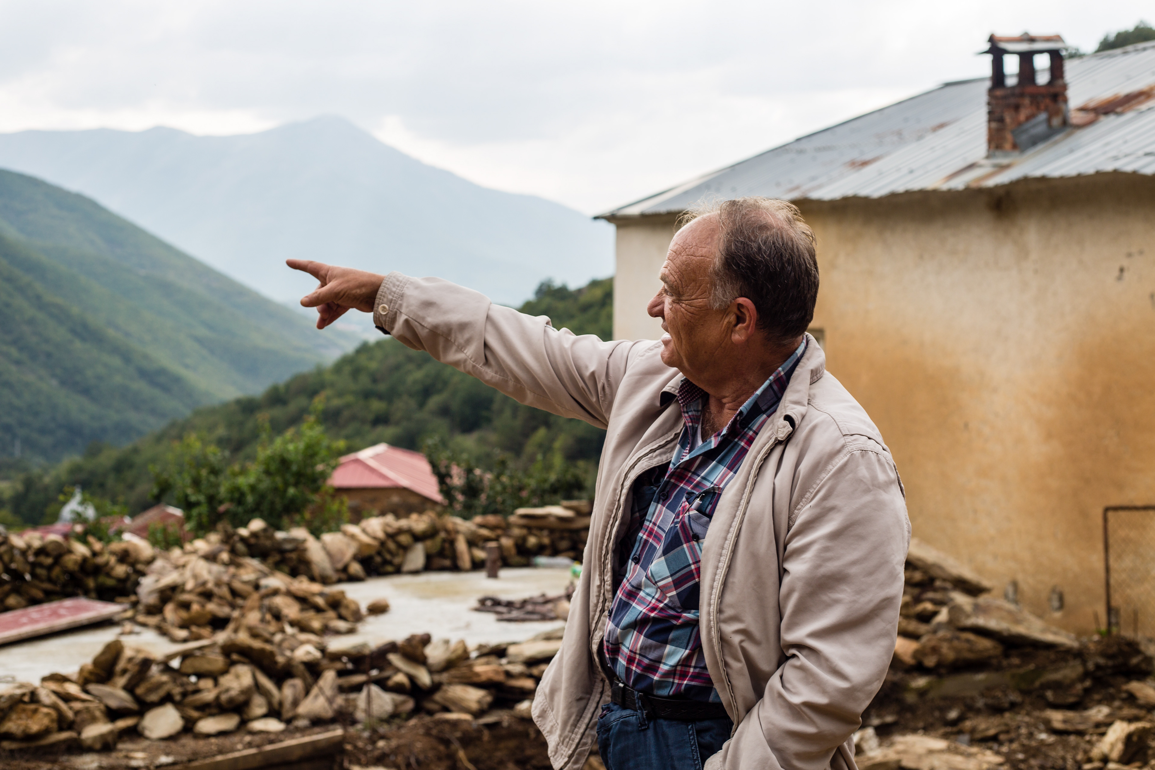 The village was Rusjatsi (Русјаци) in the western hills of Macedonia. As we pulled up, we ran into Simon. Here he is standing on top of the guesthouse he is constructing in the center of the village. He had recently returned from Australia, after spending the last 35 years there in the ‘special forces.’