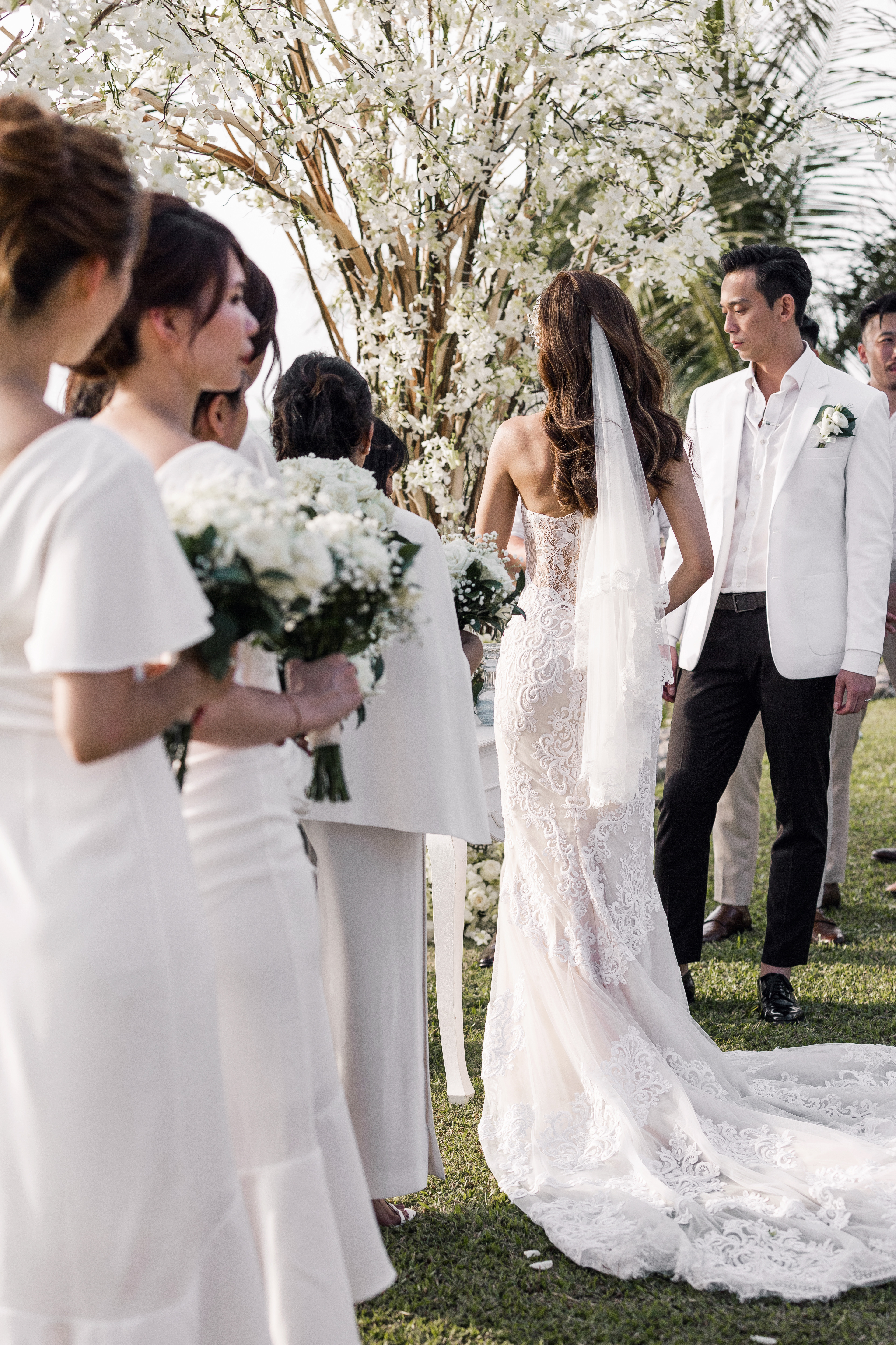 Bride and groom exchange vows photographed at Sava Beach Villas Phuket