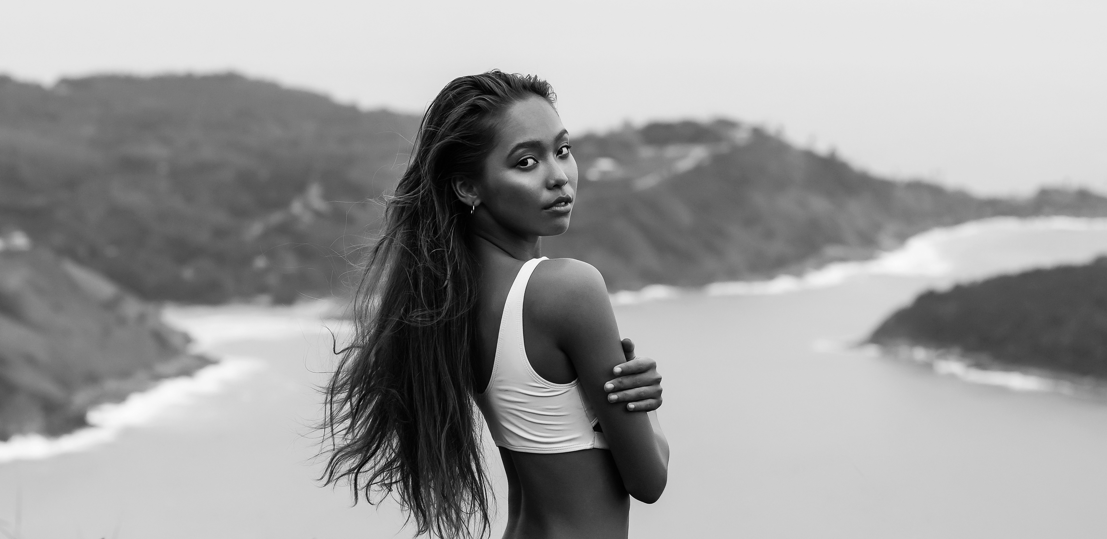 Portrait of a girl looking behind her shoulders in Rawai Phuket Thailand