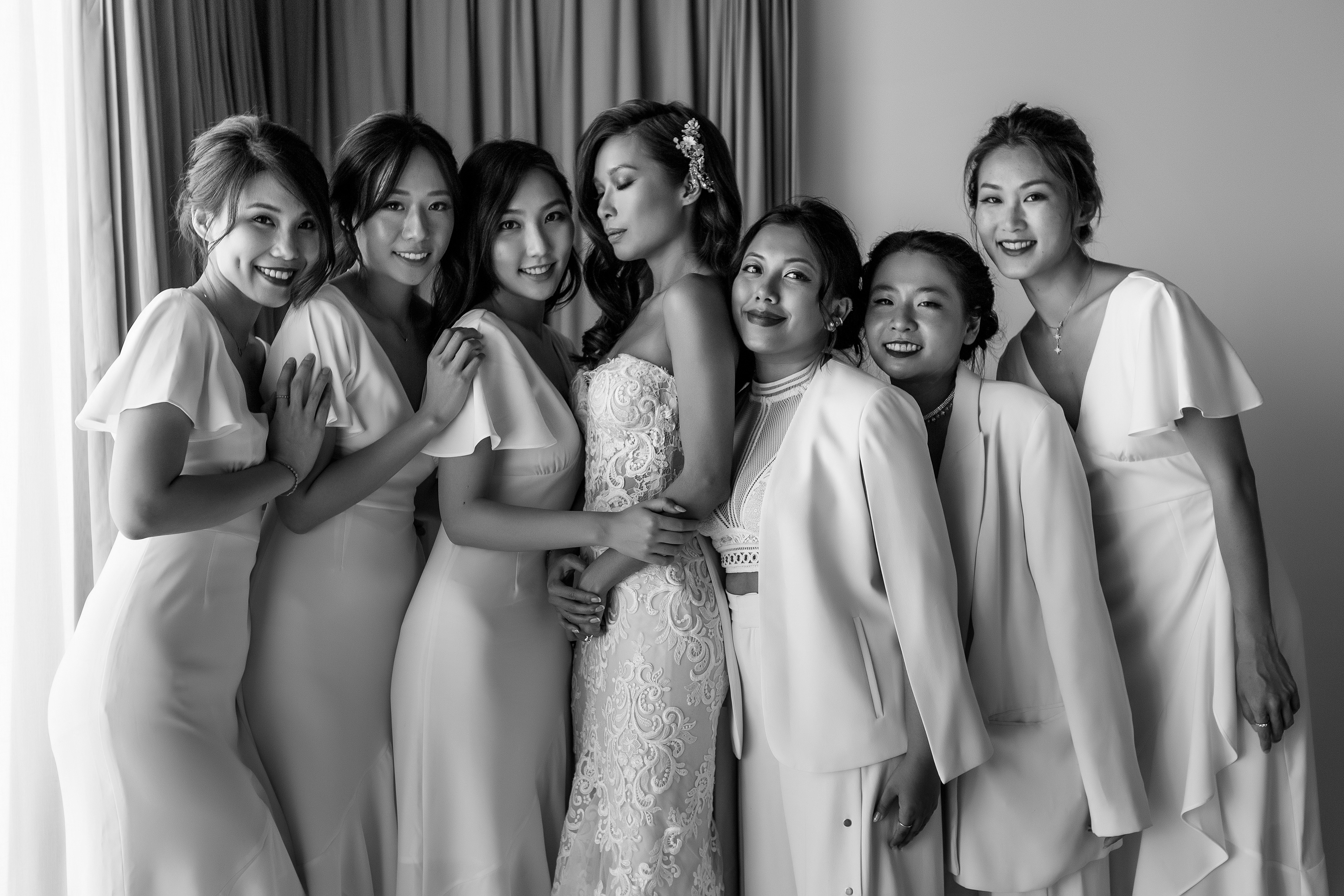 Joyful bride and bridesmaids from Hong Kong