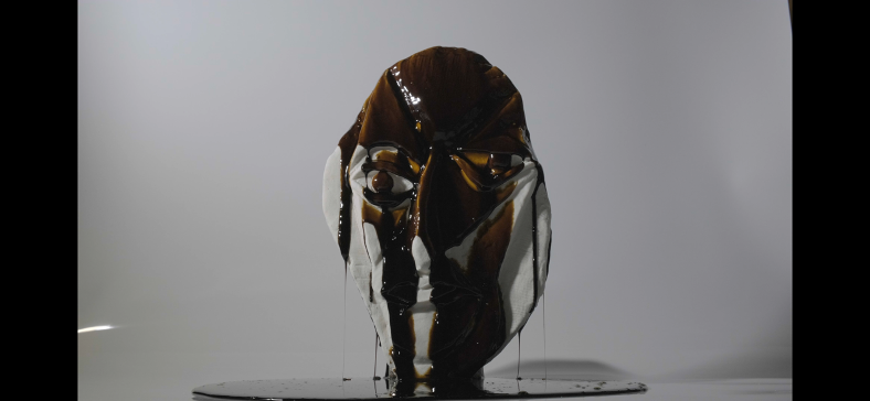 End of PHILANTHROPIST III (14min video piece on loop, sugar plate cast sculpture and molasses)