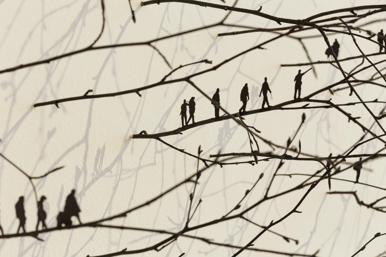 Prolonged by a Hundred Shadows (2019), twigs, paper, paint, twine, 240cm diameter