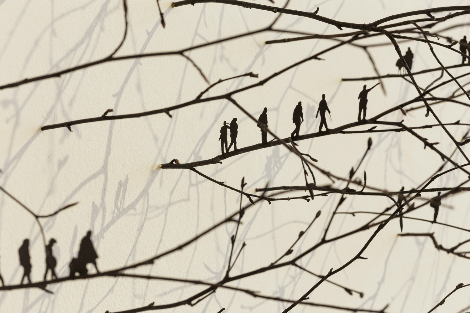 Prolonged by a Hundred Shadows (2019), twigs, paper, paint, twine, 240cm diameter