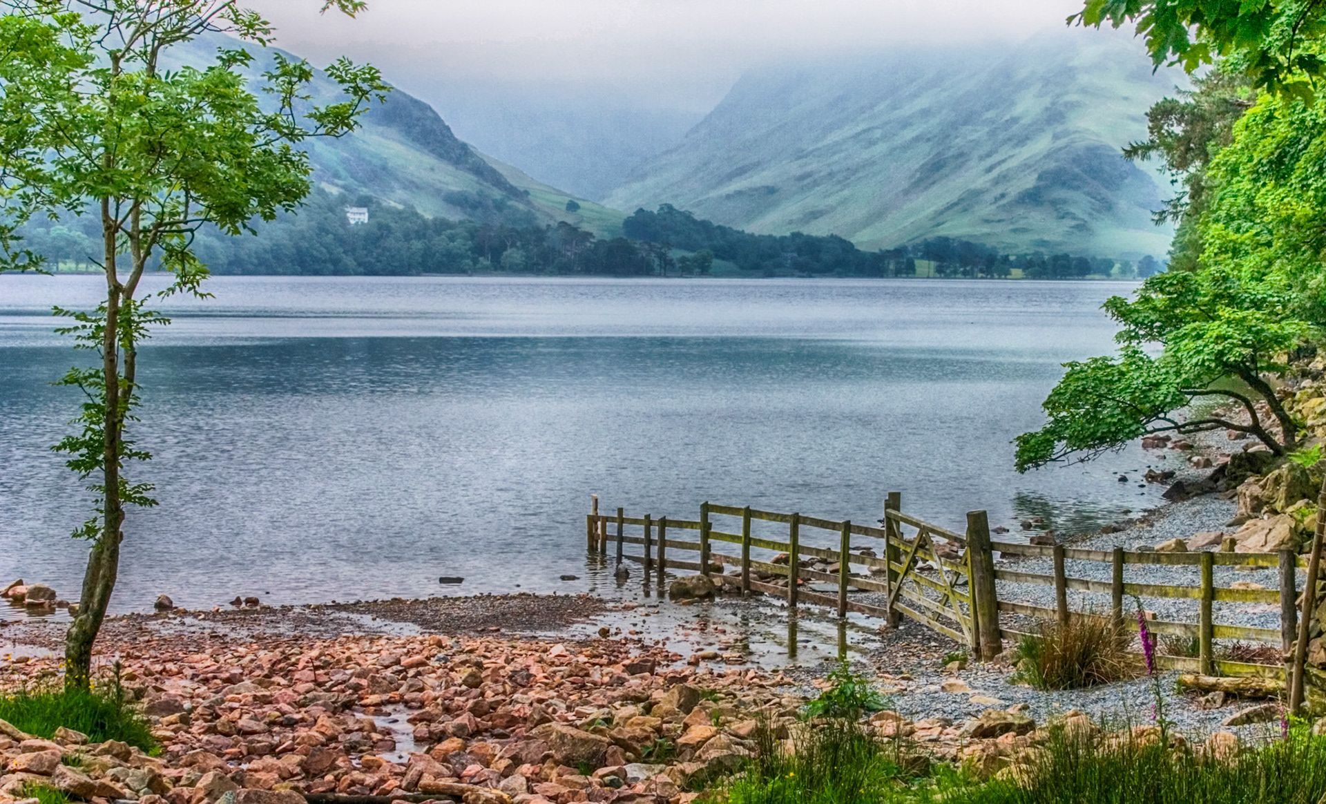 Low cloudsnover Buttermere Lake in the Lake District National Park, Cumbria, UK. 