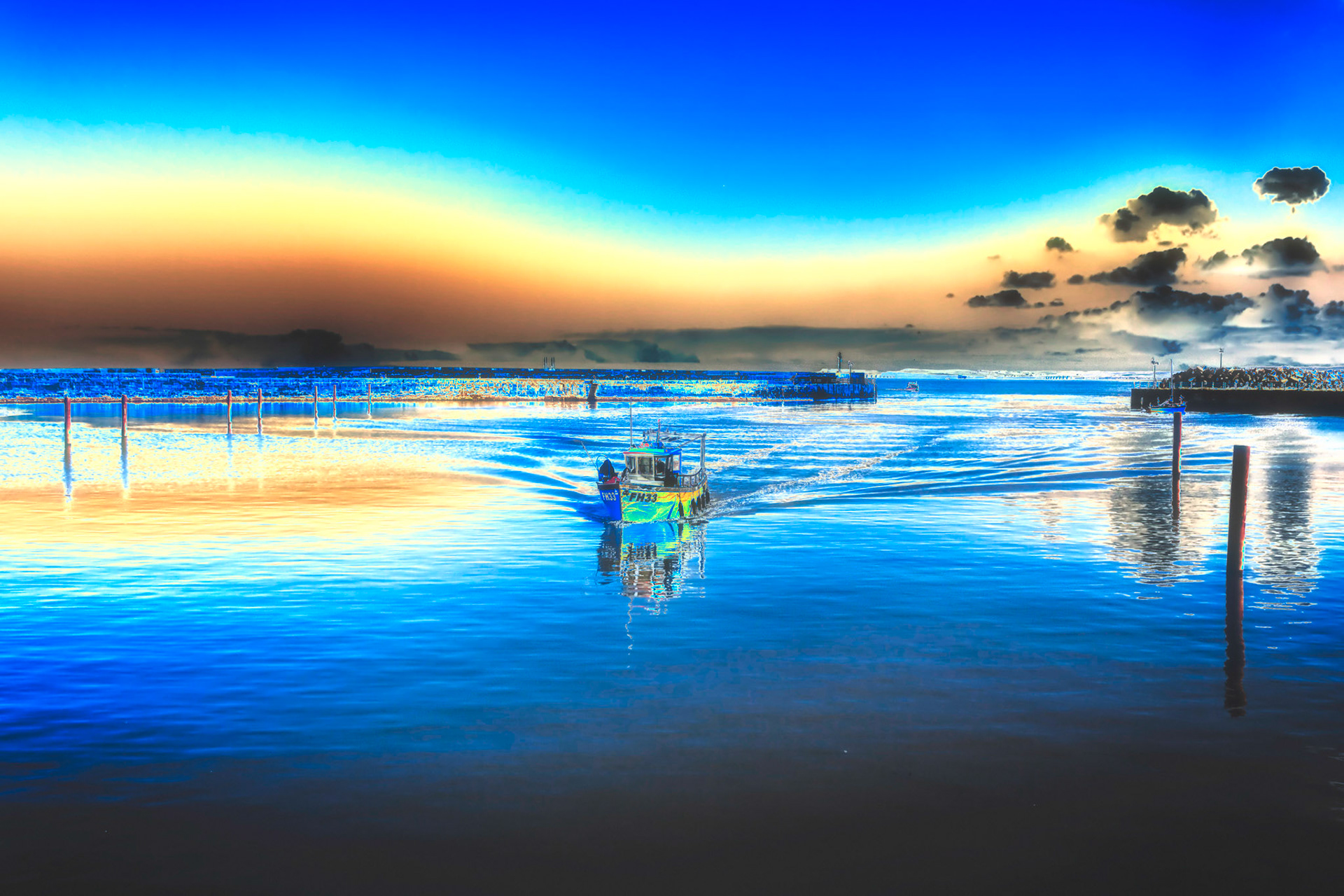 A lone fishing  boat disturbs the unusually still North Sea waters as it returns to port.Hartlepool in north-east England. This image with a solarisaation effecr aapplied for something different.