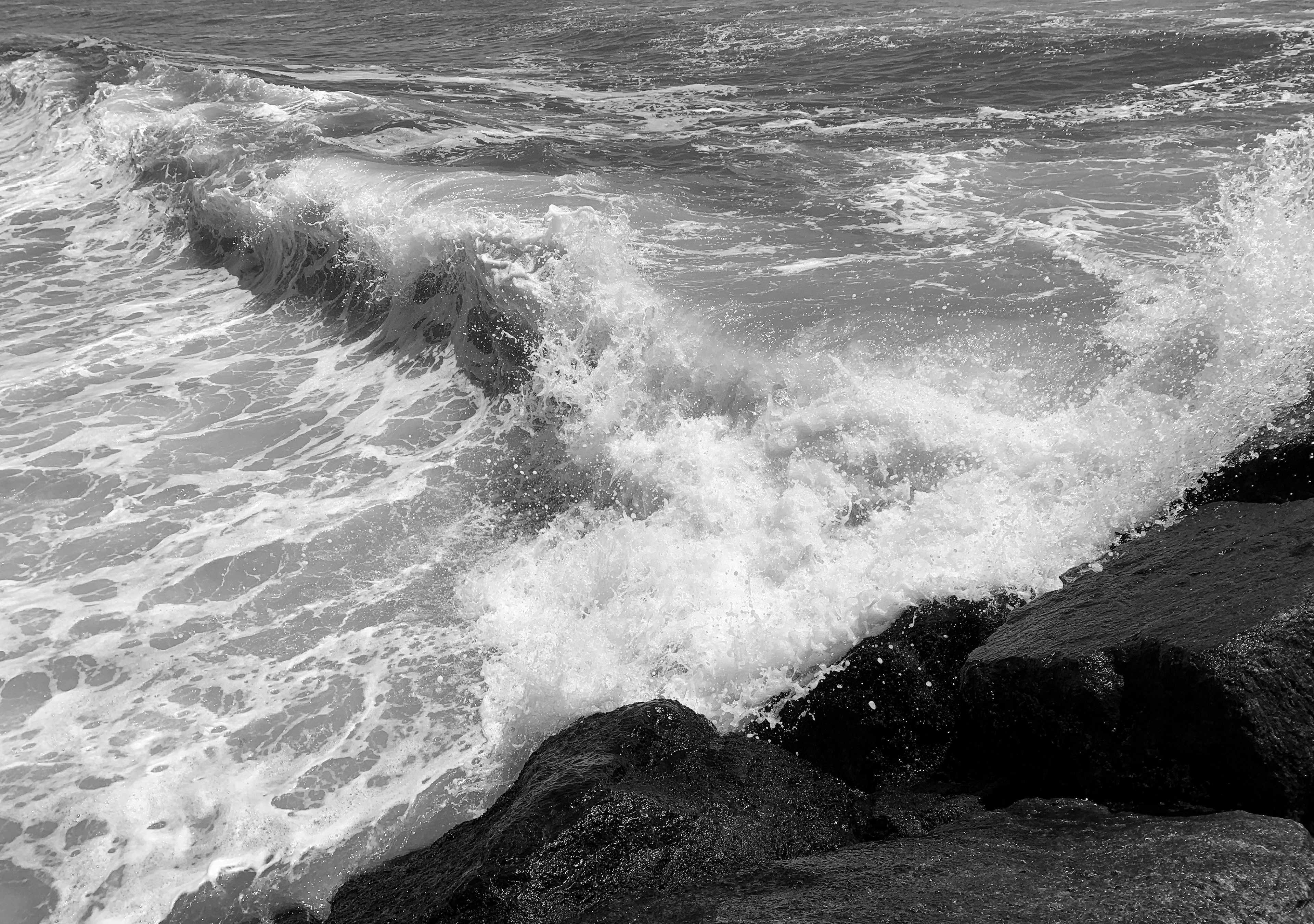 wave cresting, view from the jetty