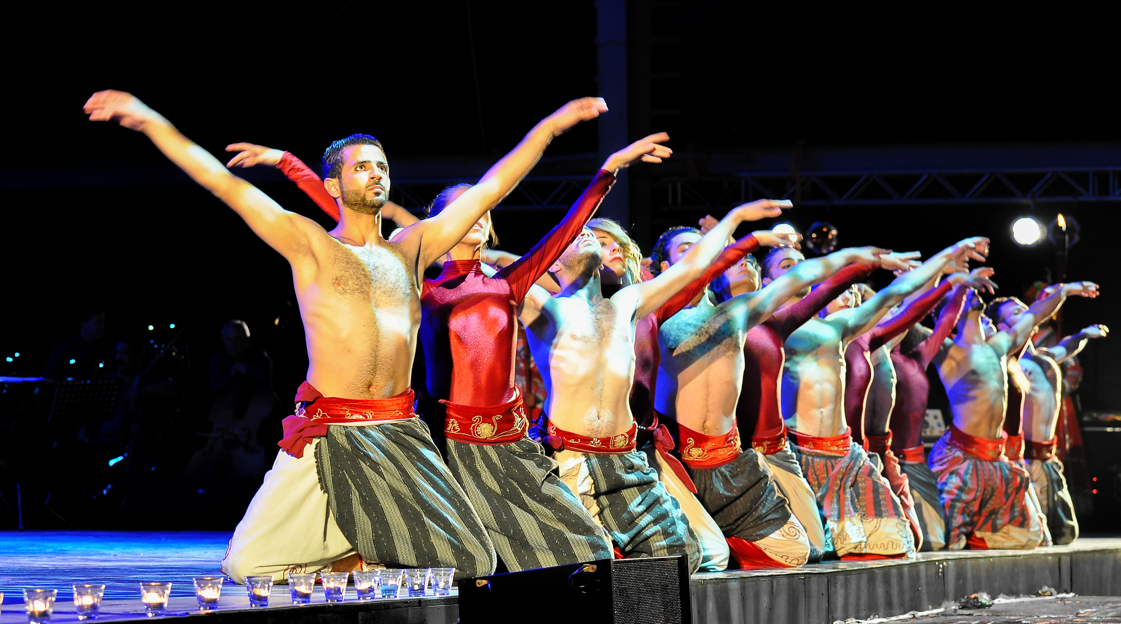 The 13-members Syrian dance group "Sima" performing on the stage of Beiteddine. They produced a frenetic dance piece over hard techno beats full of technique and drama. The Beiteddine Festival is an annual summer Art & Music festival that takes place in Beiteddine Palace in Beiteddine, Lebanon.