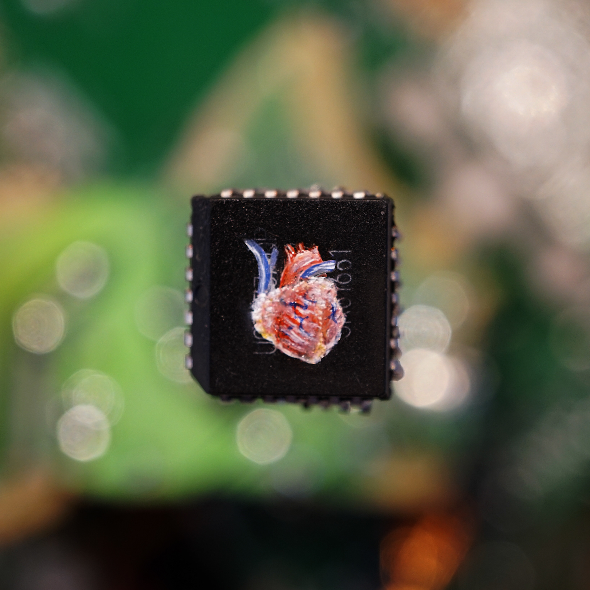 <3 2.0 (detail), Oil paint and e-waste, 2019