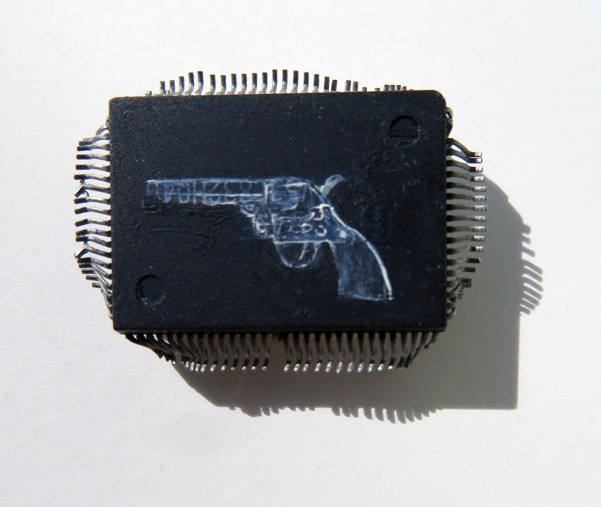 Revolver, oil on microchip, 2011