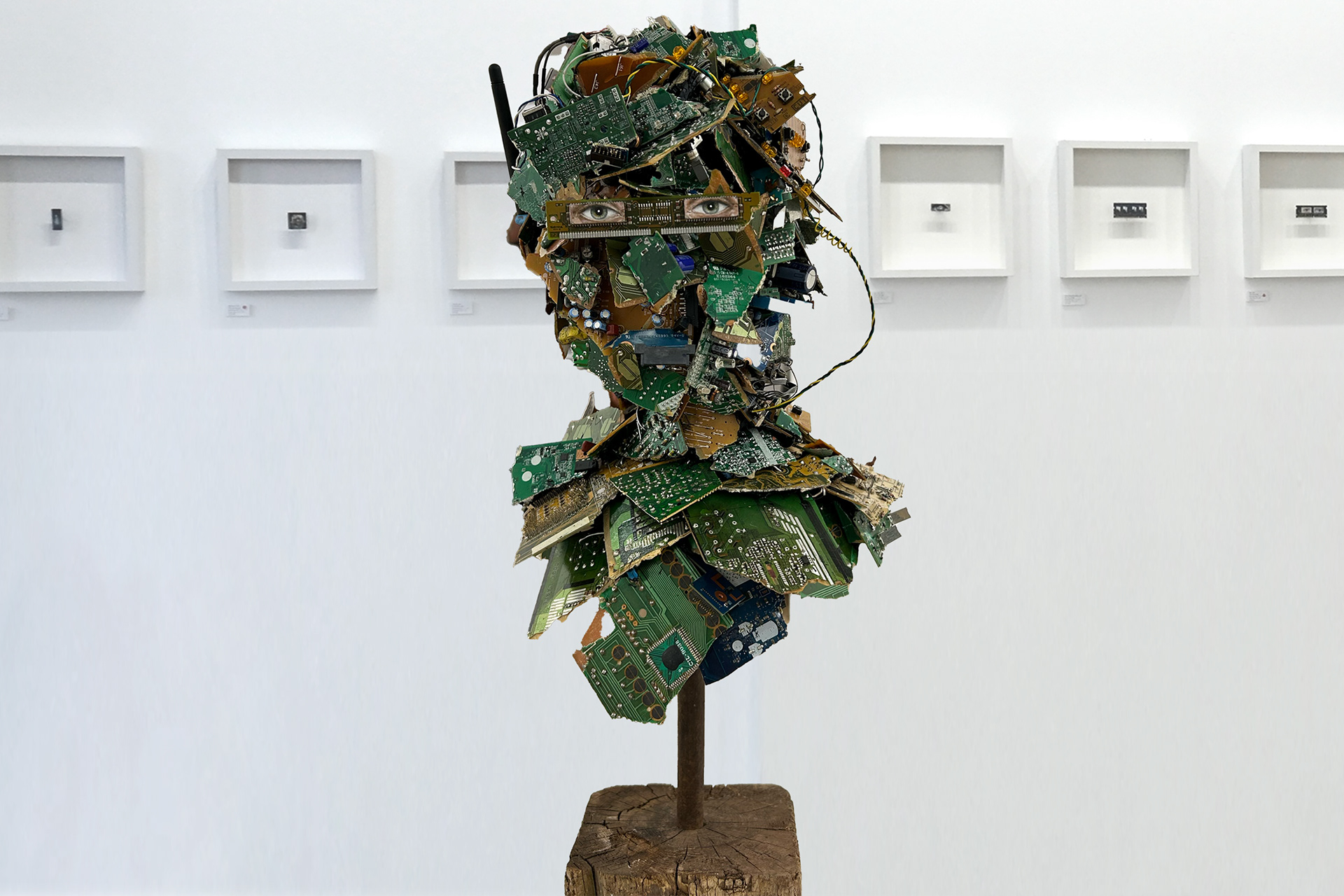 Bust of Connected Human, oil paint, electronic waste, metal and wood, 2024