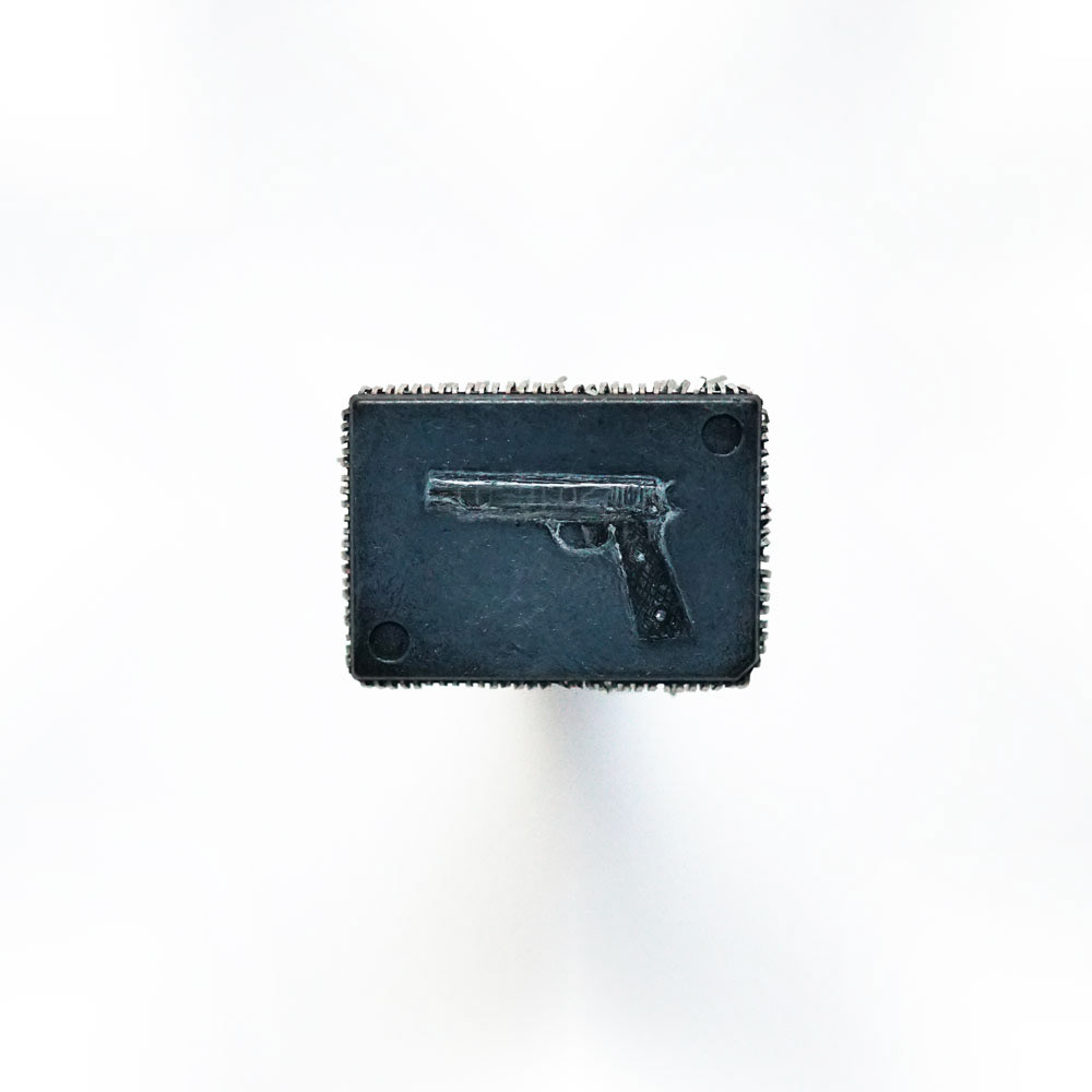 Colt .00045, Oil paint on microchip, 1 x 1.5 cm, 2018