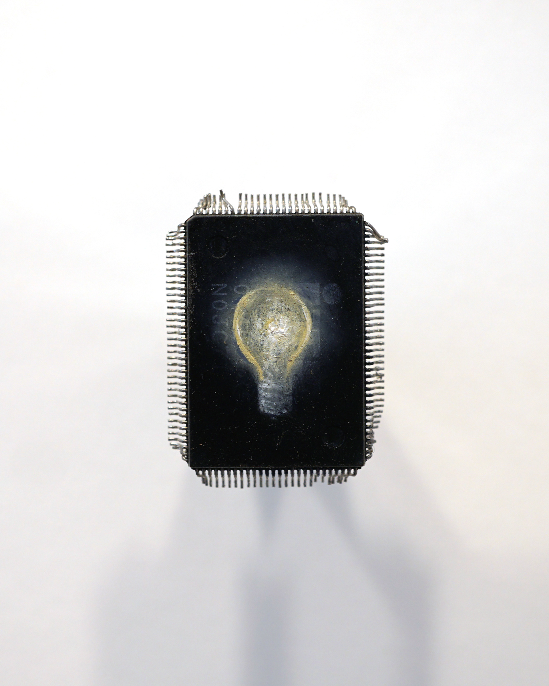 💡, oil on microchip 1x2 cm