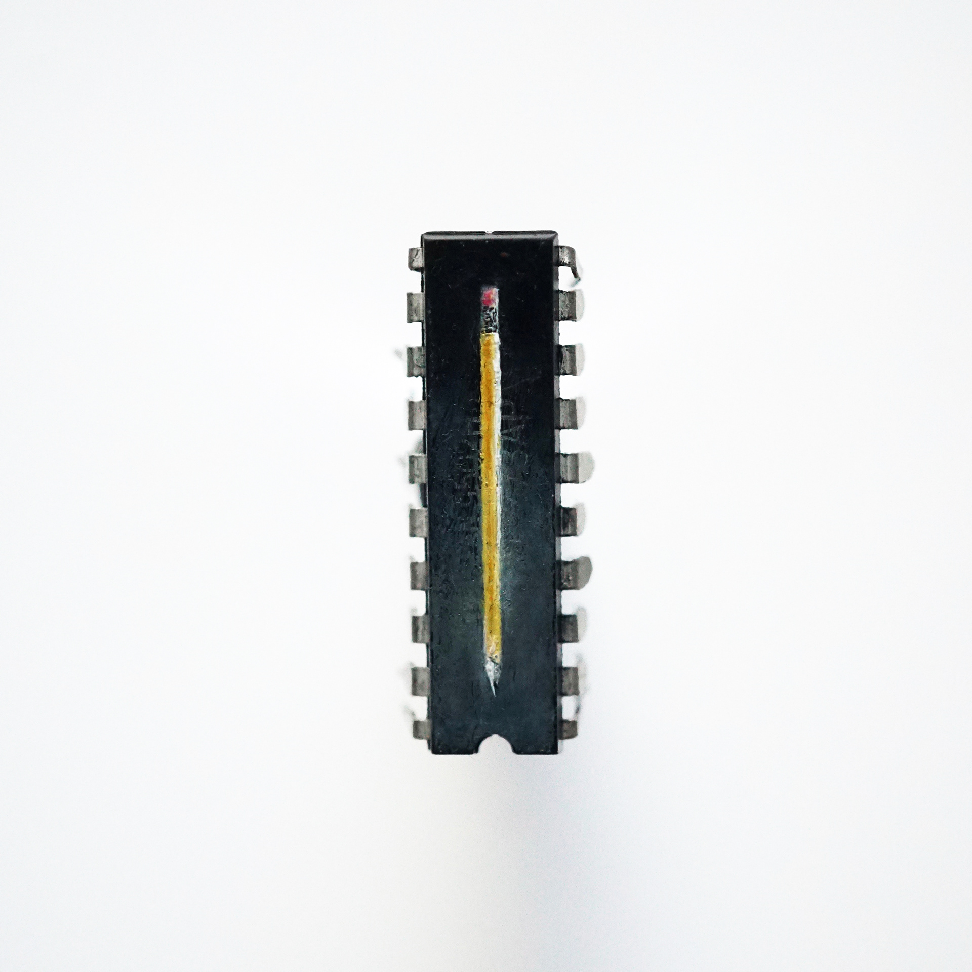 Nº2 Pencil, Oil paint on microchip, 0.5 x 1.5 cm