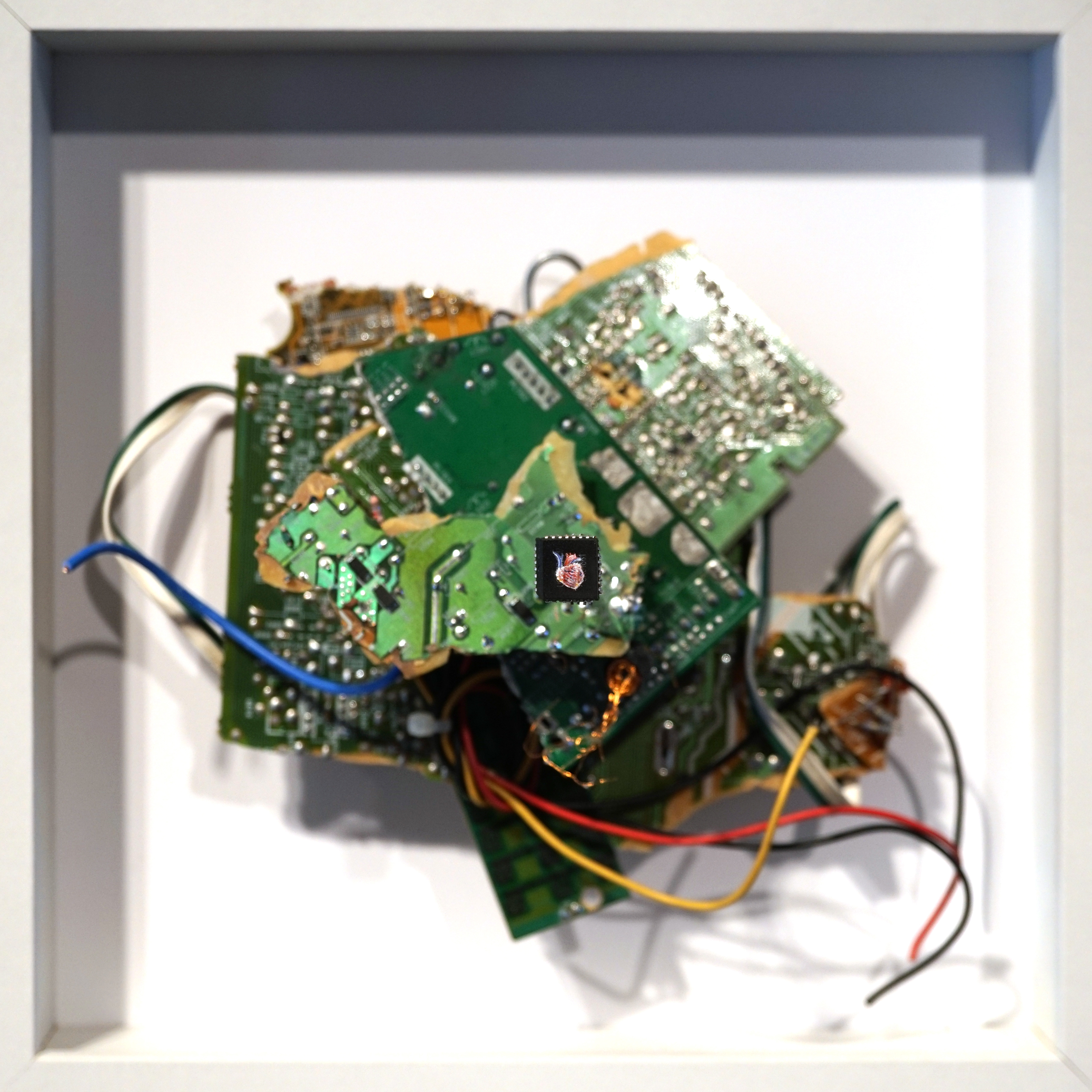 <3 2.0 (detail), Oil paint and e-waste, 2019