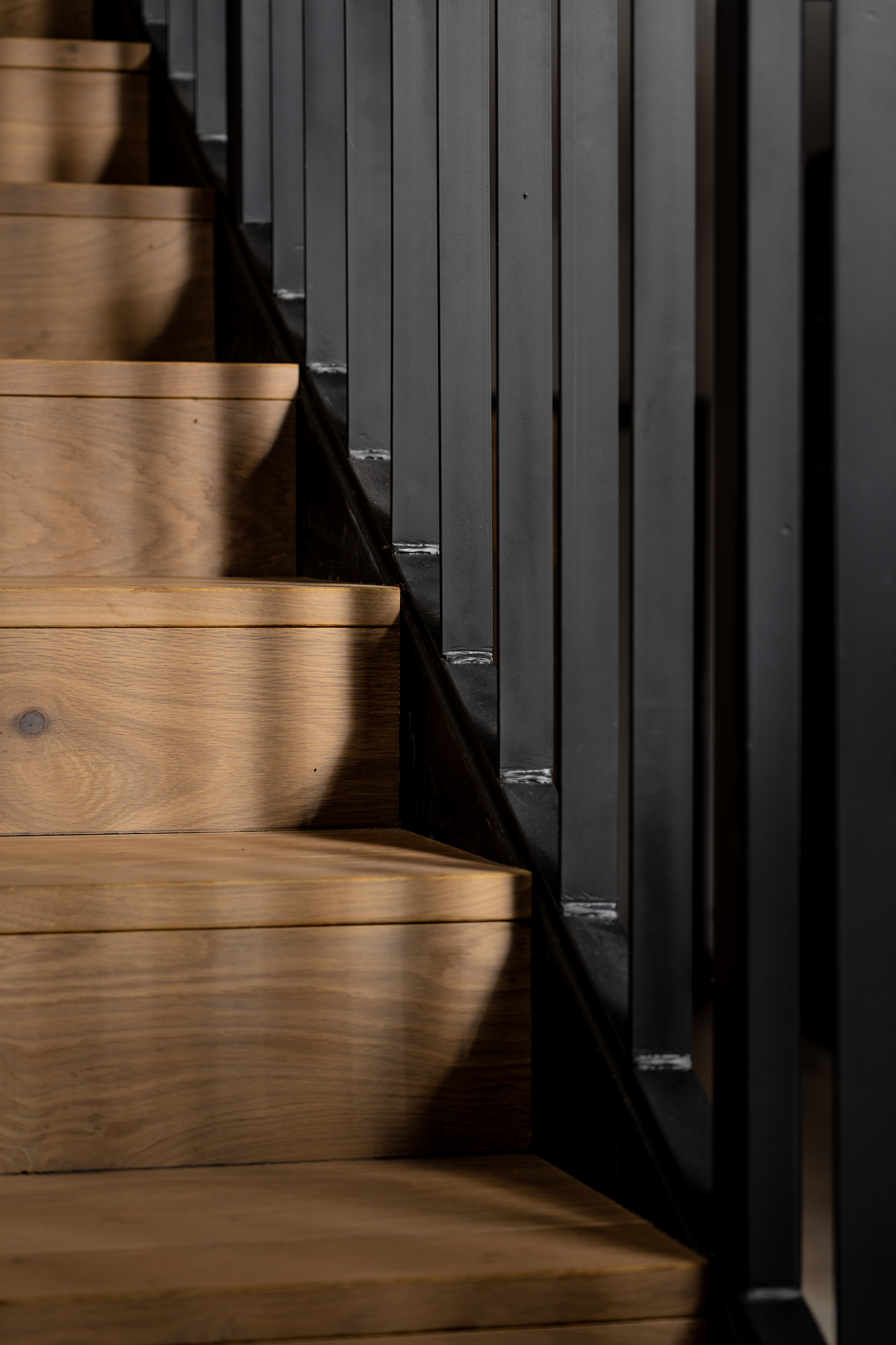 Close view of the metal balustrade detail to the new timber staircase.