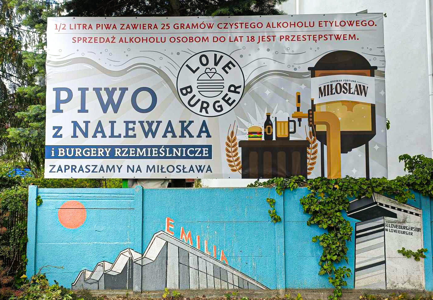 Billboard for "Love Burger," specializing in artisanal burgers.