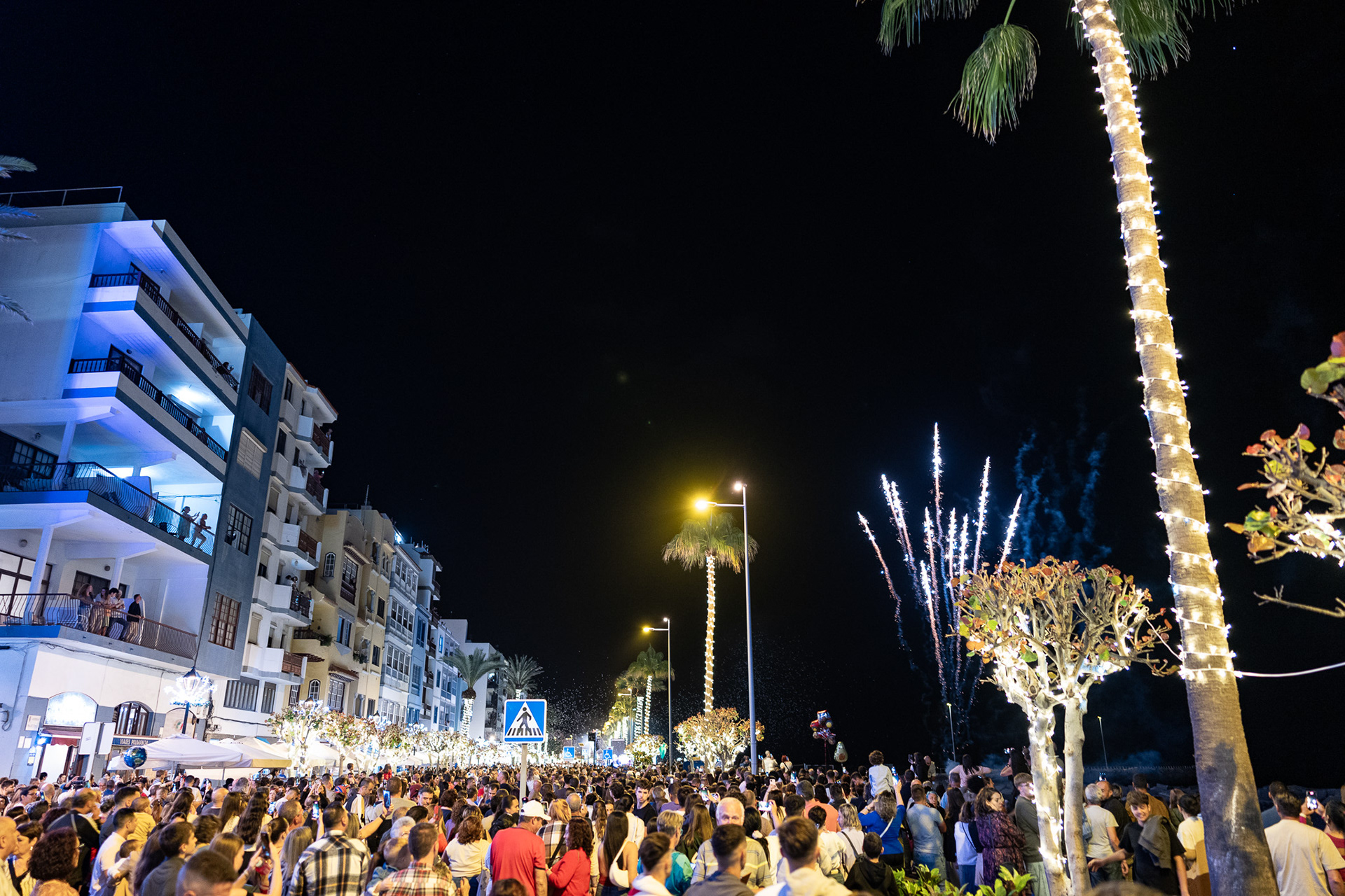 Residents from all over the island congregate in Santa Cruz to participate in an earl Christmas celebration