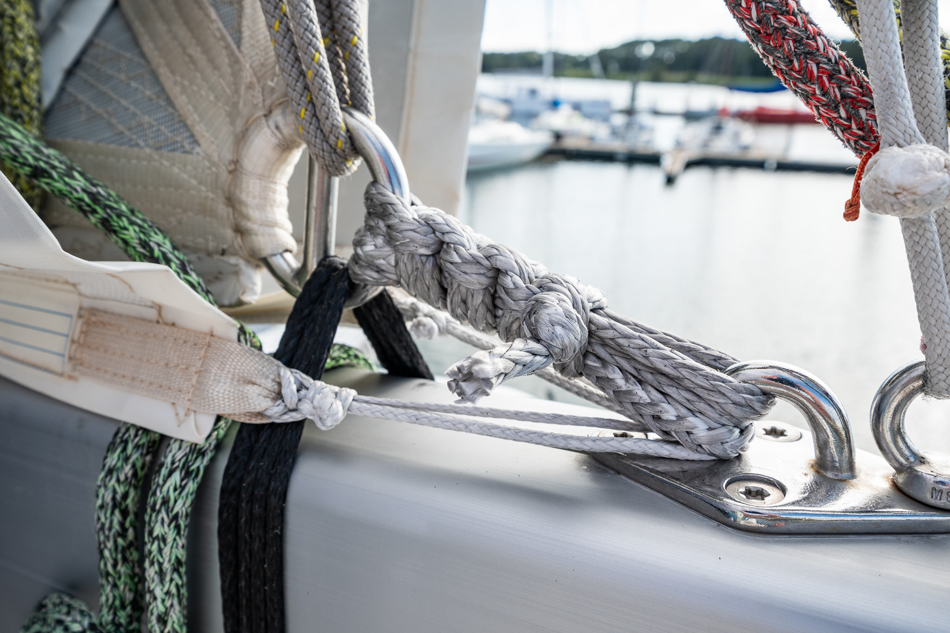 Working on some mainsail clew lashings, as well as new sailbag lashings to tidy things up and help reduce chafe
