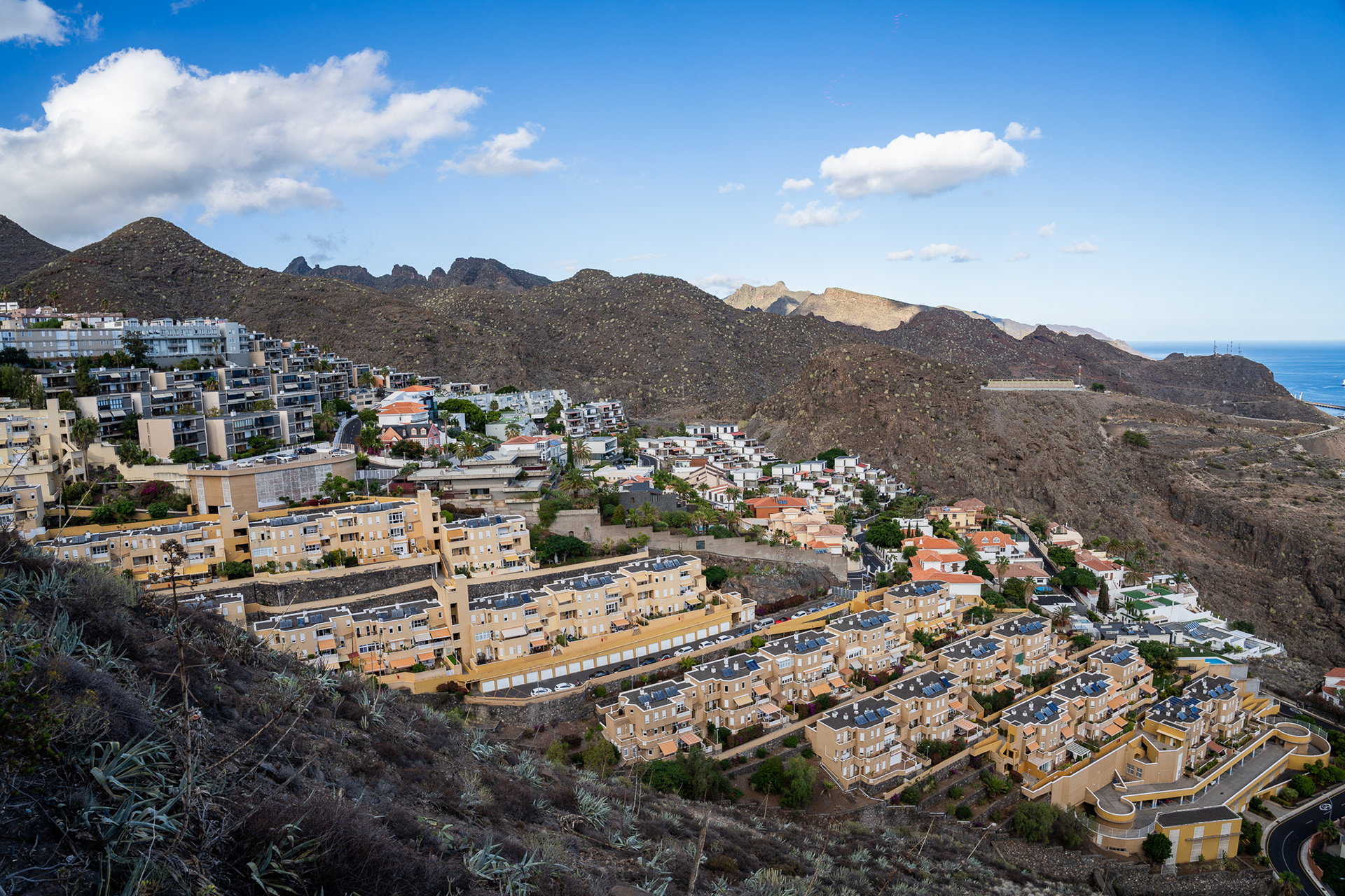 Los Campitos, a quaint town along the Tenerife mountains, with a winding road passing through