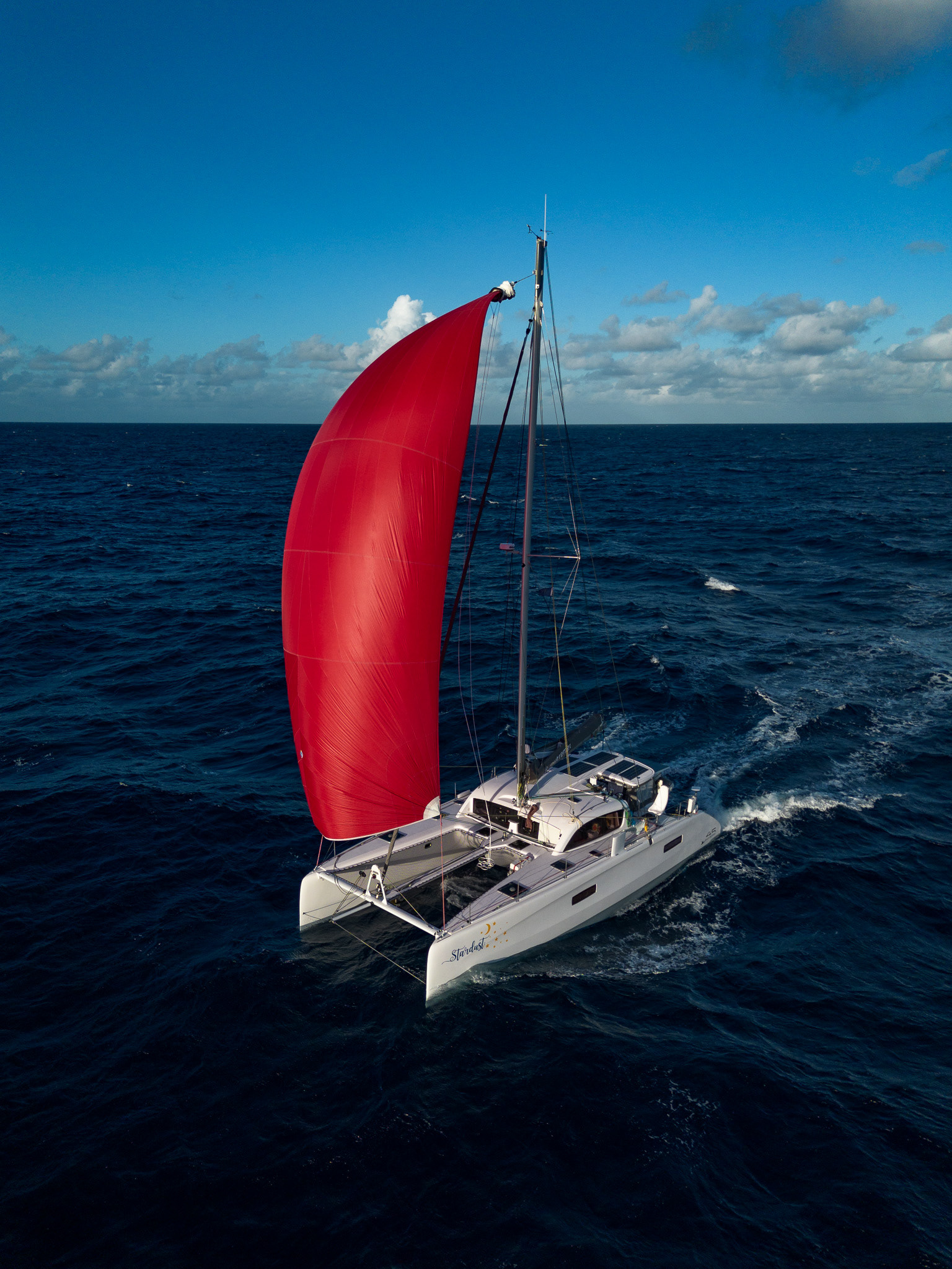 Stardust's spinnaker pulling her along in the tradewinds